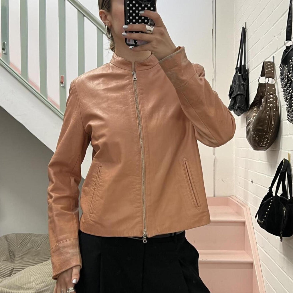 baby pink dusty pink zip up fitted vintage leather jacket with dual zip