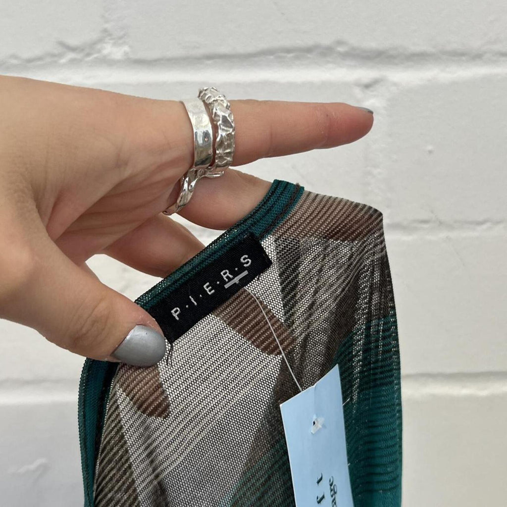 black white and teal striped mesh longline top with tie waist