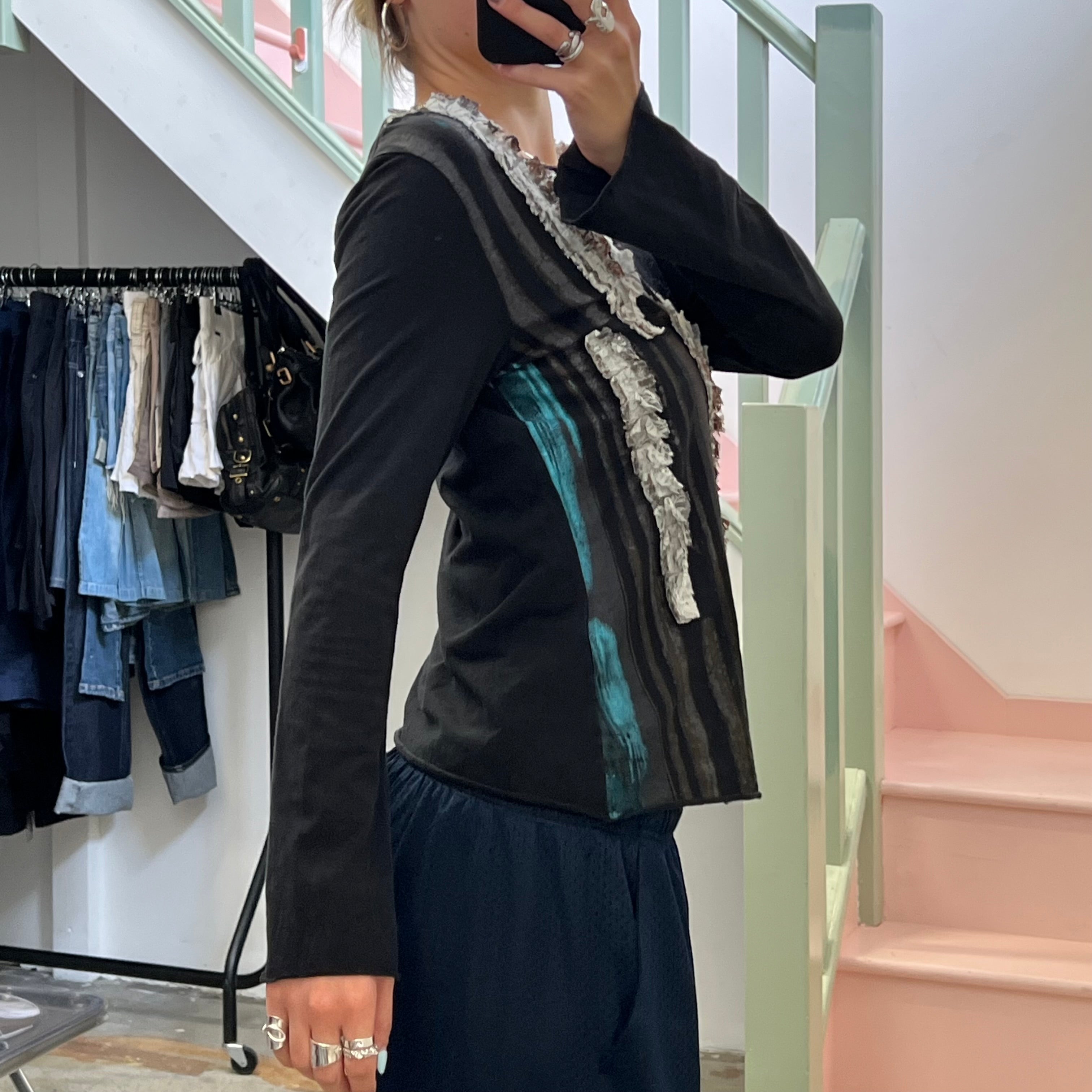 Black textured long sleeve top