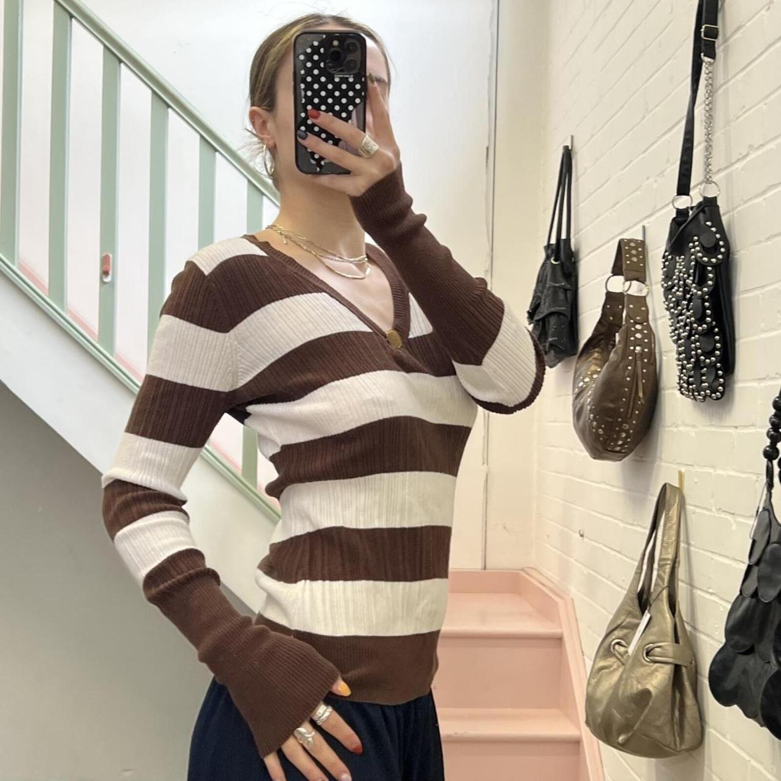 White and brown striped ribbed v neck sweater