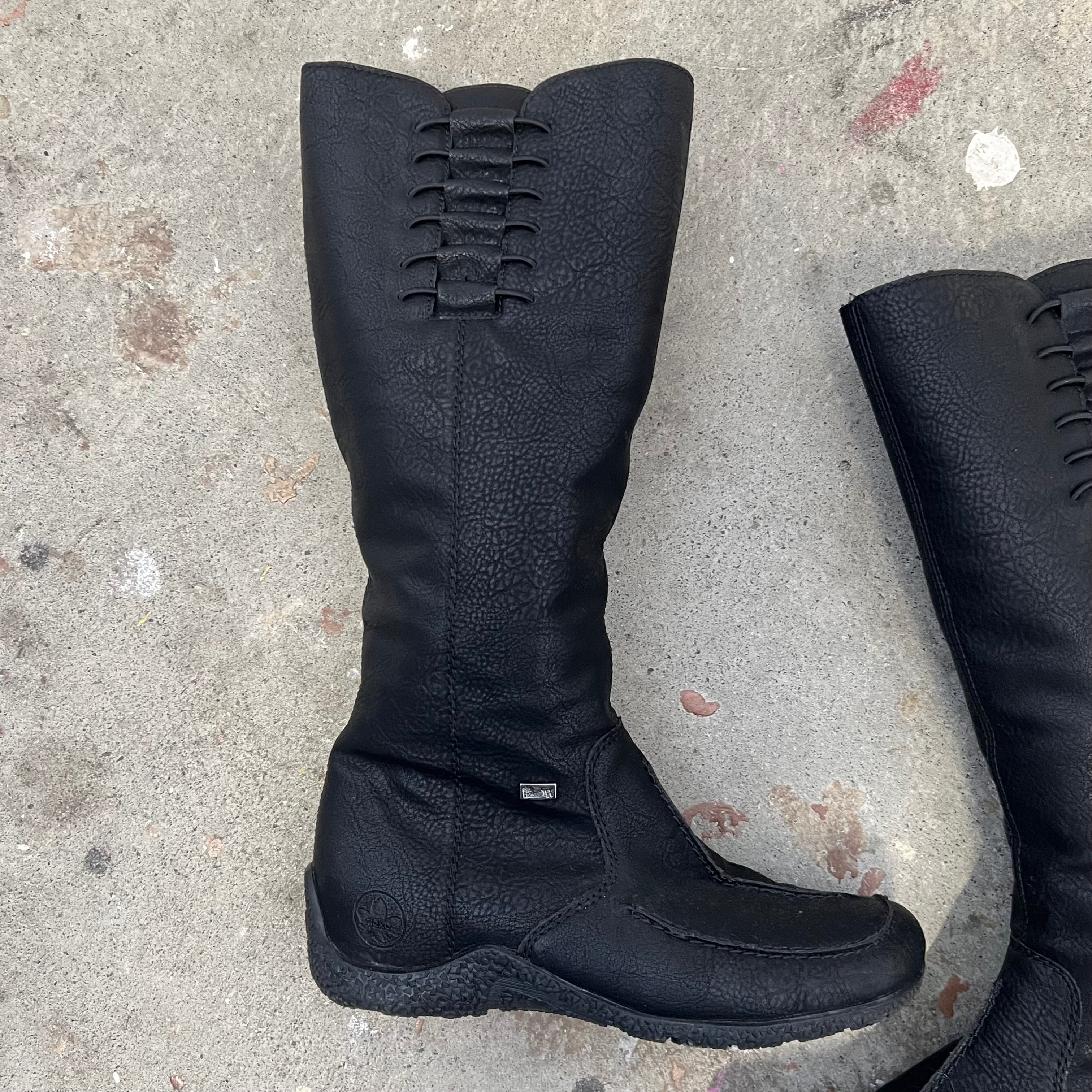 Black faux leather flat lace up knee high boots