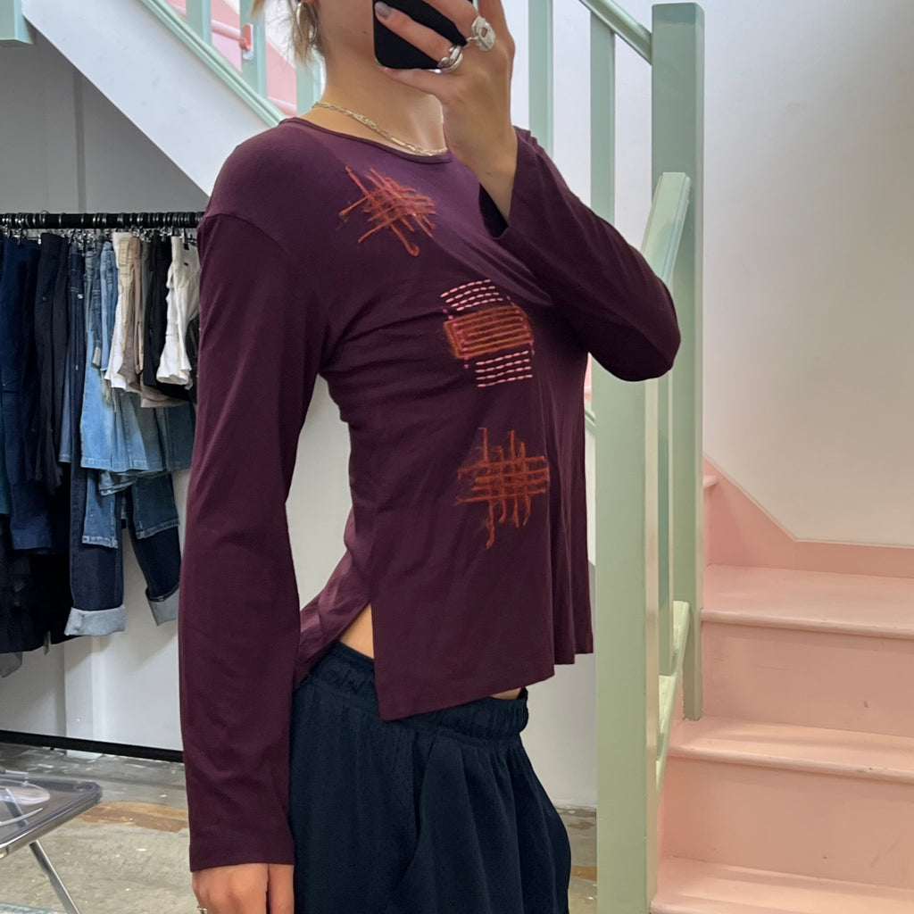 Propel mad orange contrast stitch top,