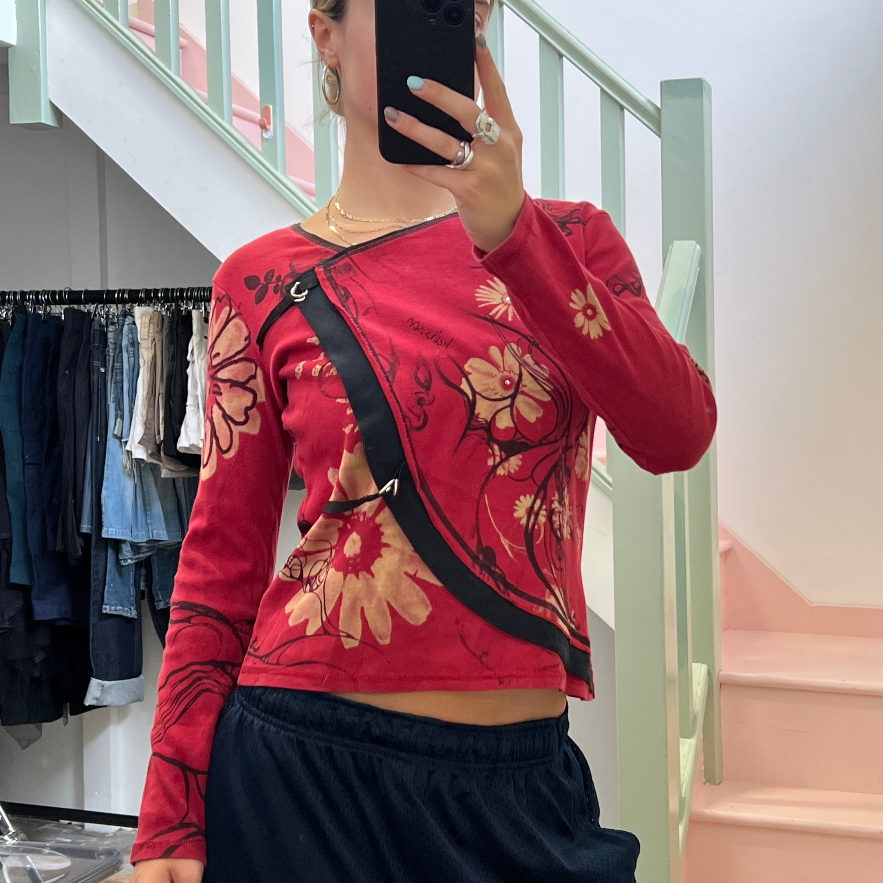 Red blurred floral long sleeve top