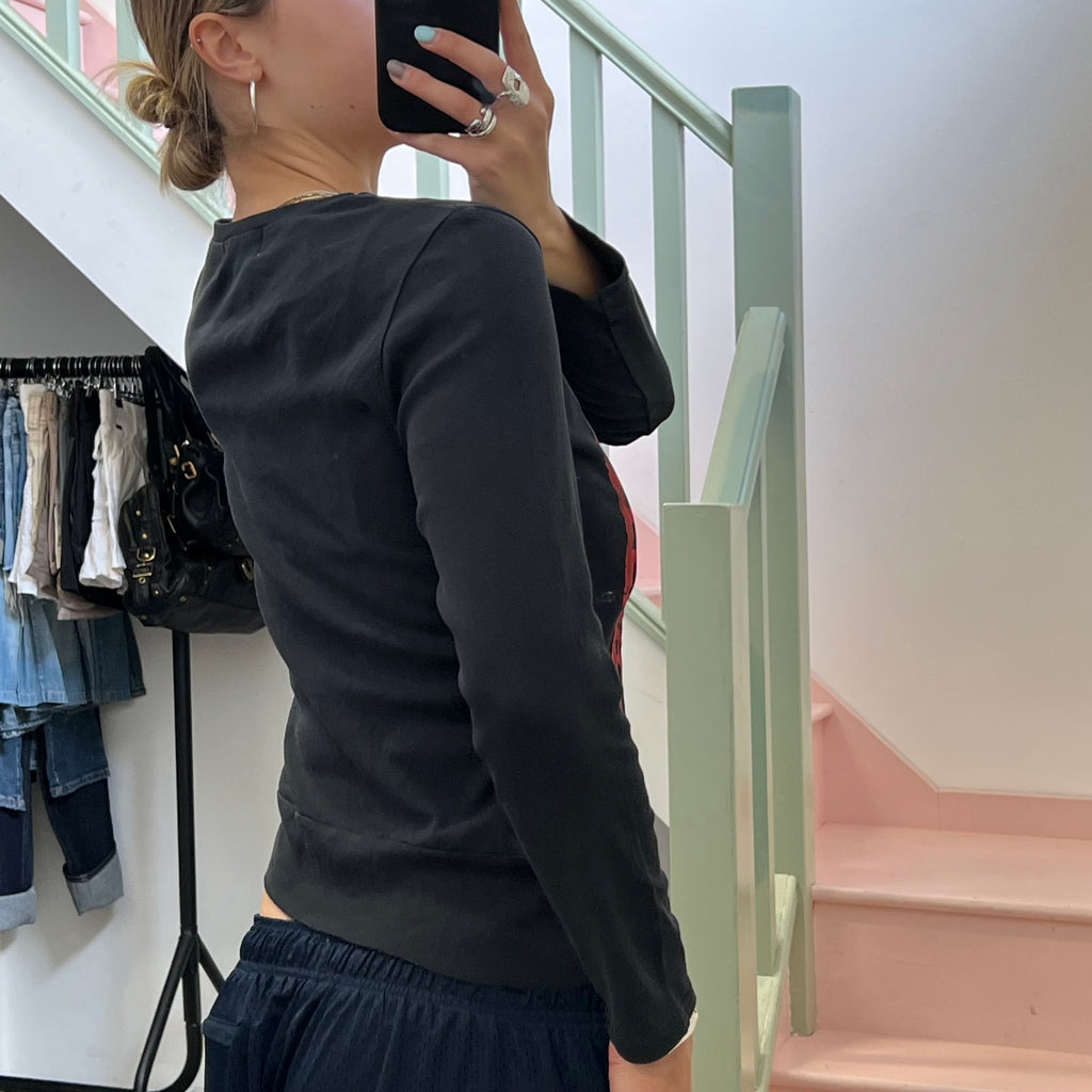 Black and red graphic print zip top
