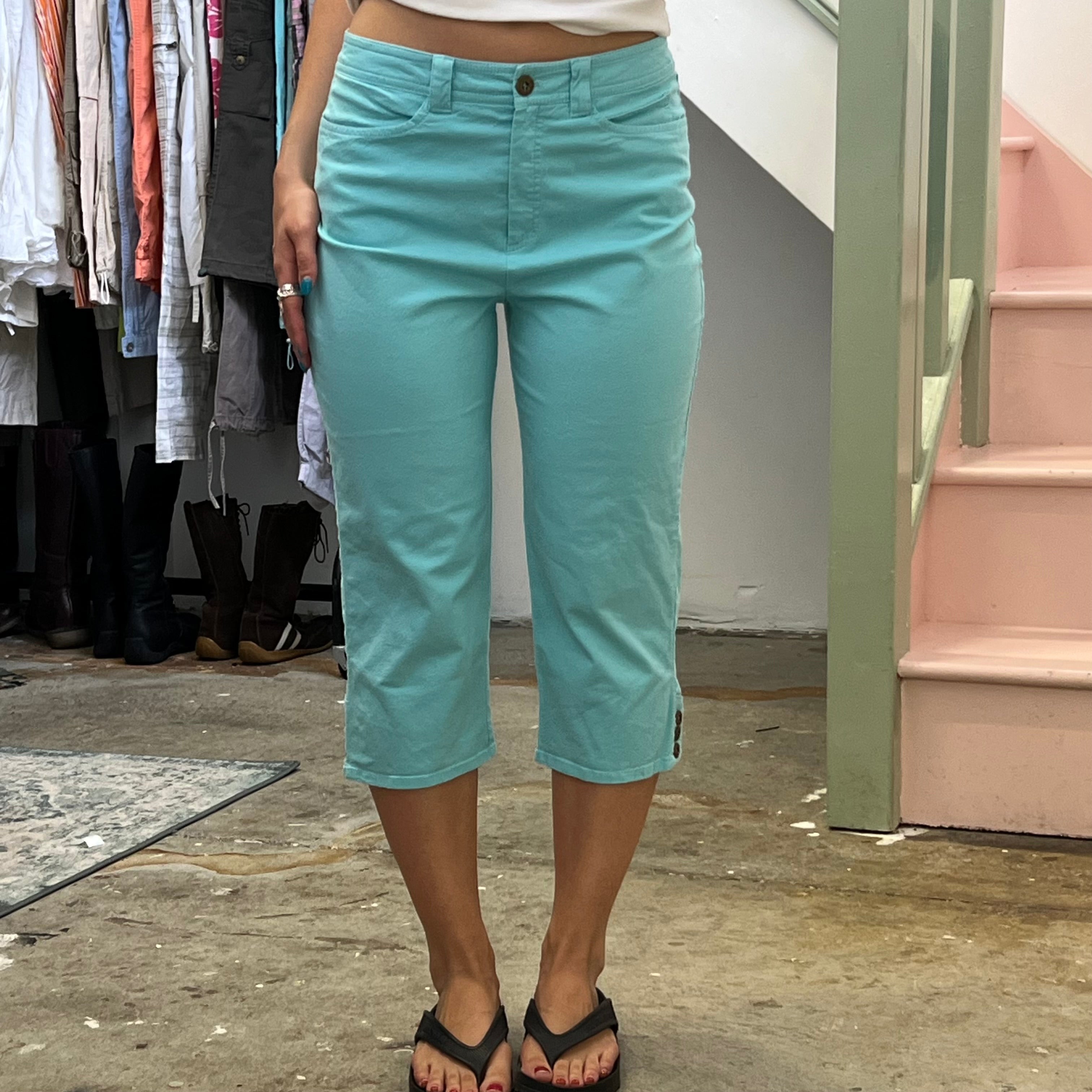 Aquamarine blue skinny denim capris