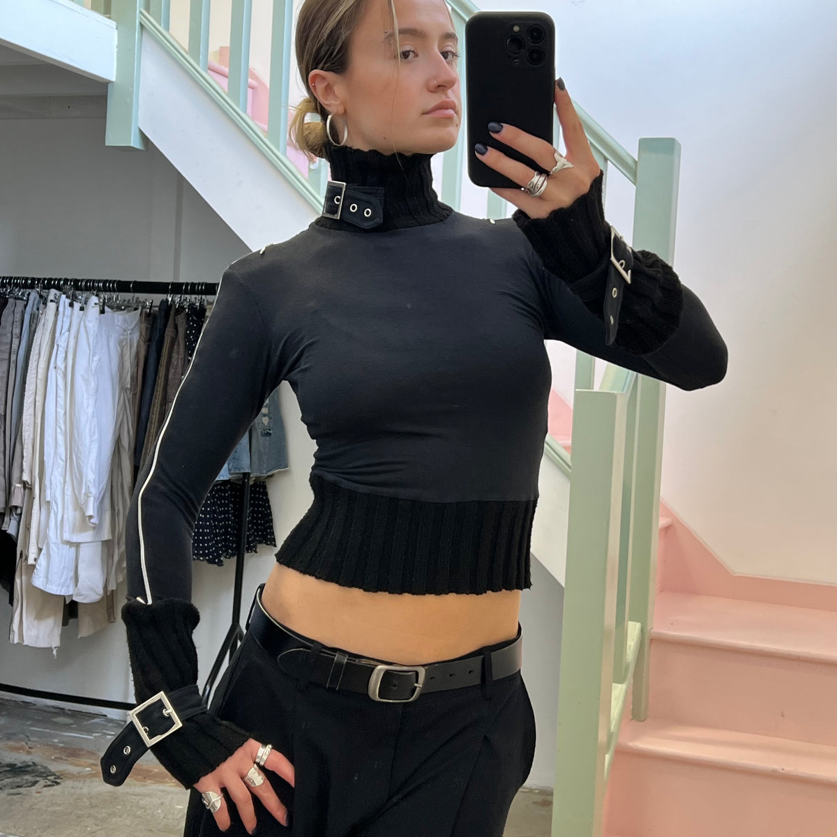 Black roll neck top with zips and buckles