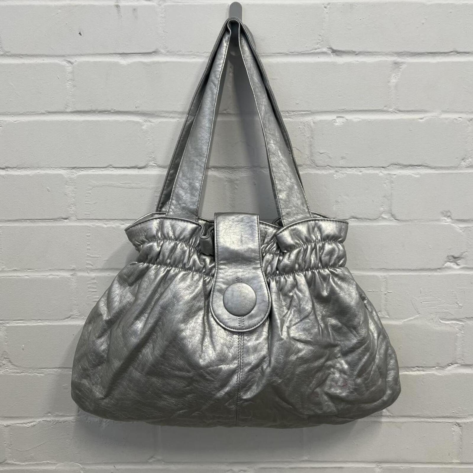 silver chrome metallic faux leather oversized handbag with chunky button detail