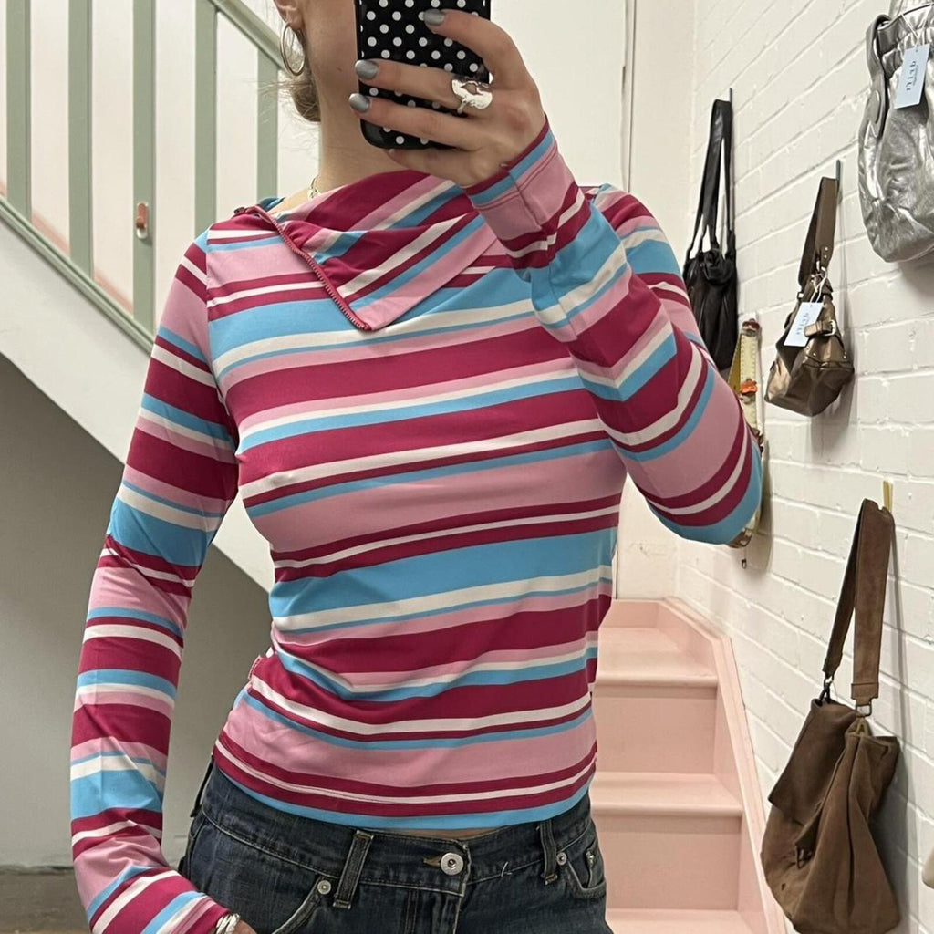 pink and blue striped high neck fitted top with zip detail