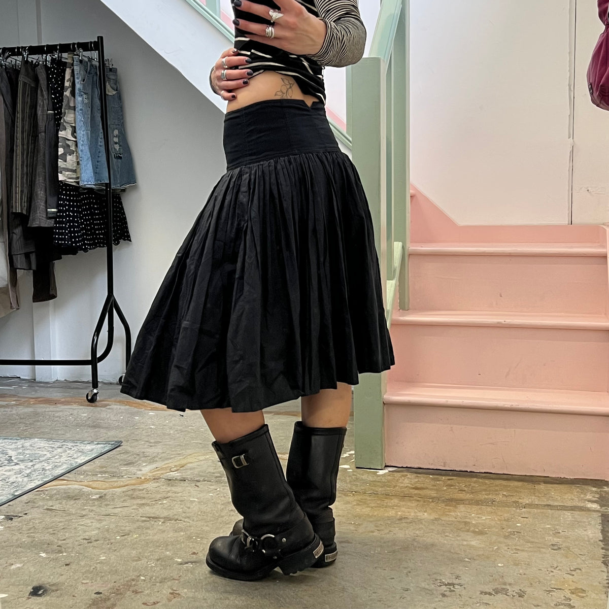 Black pleated midi skirt
