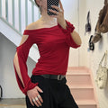 red slouchy off shoulder flared sleeve top with cutout detail