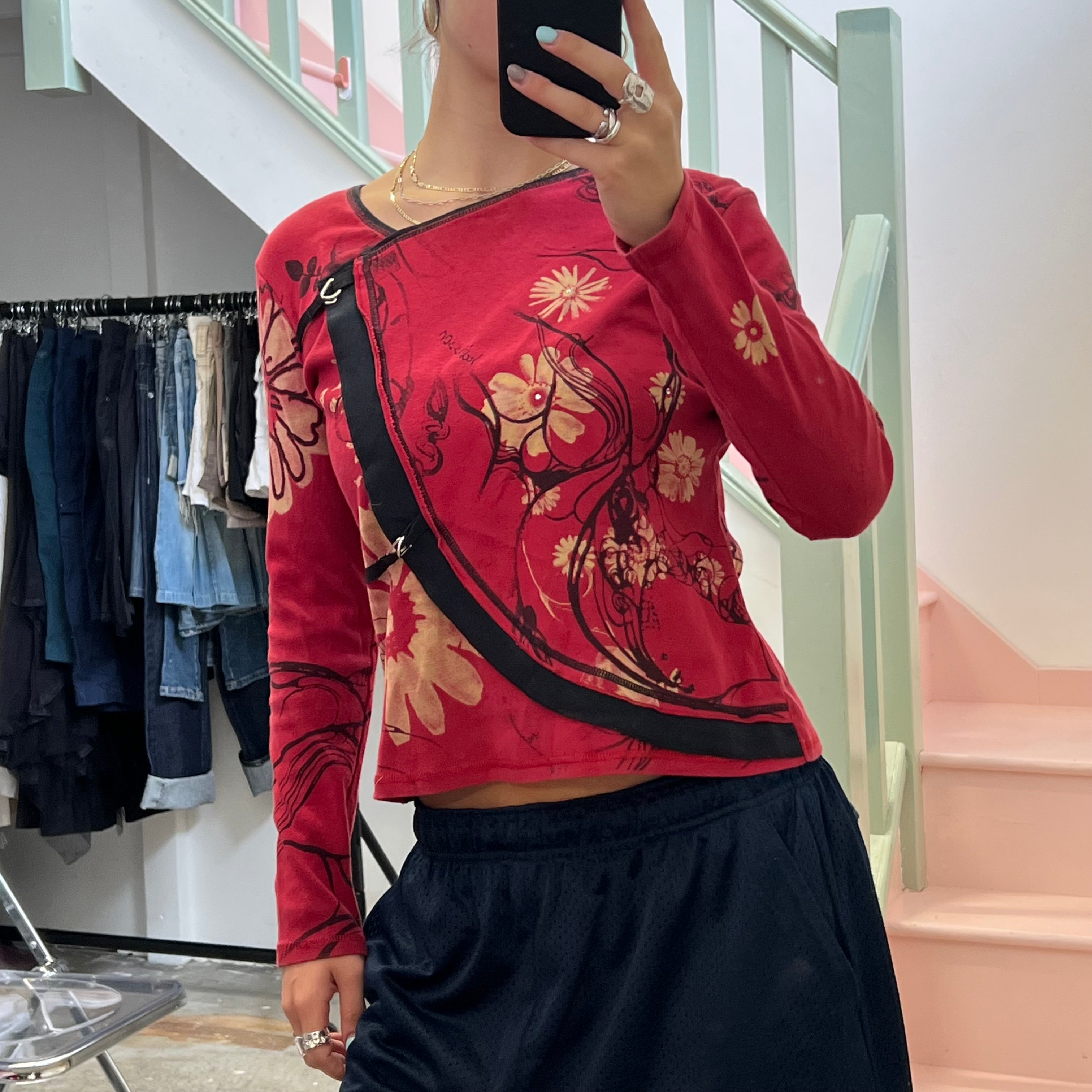 Red blurred floral long sleeve top