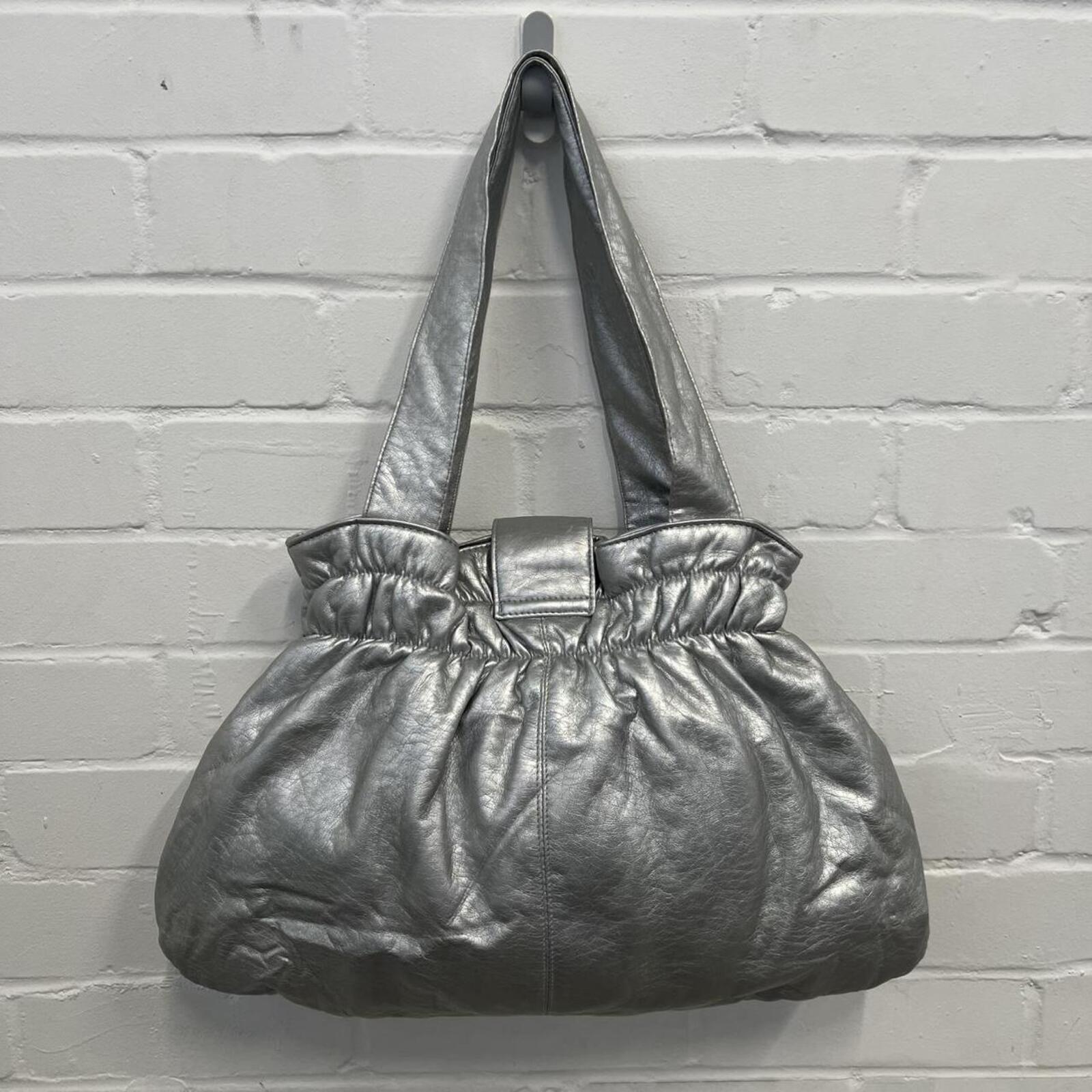 silver chrome metallic faux leather oversized handbag with chunky button detail