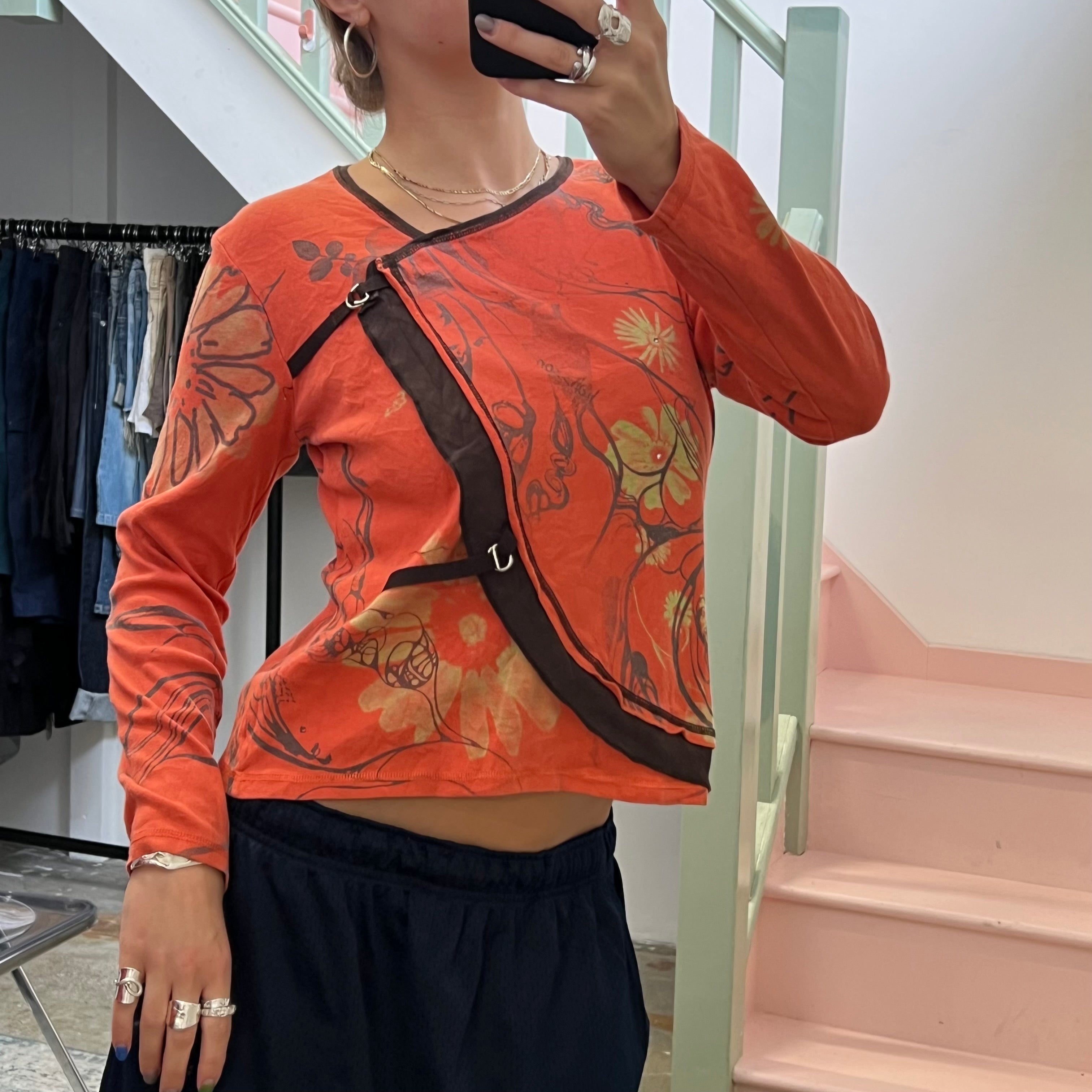 Orange blurred floral long sleeve top