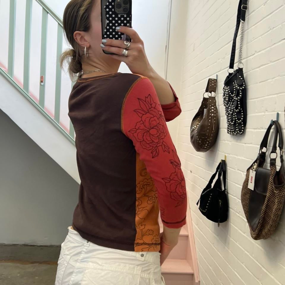 Orange and red graphic print top
