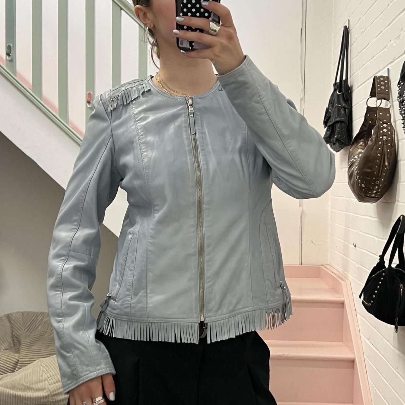 Baby blue fitted zip up leather jacket with fringing