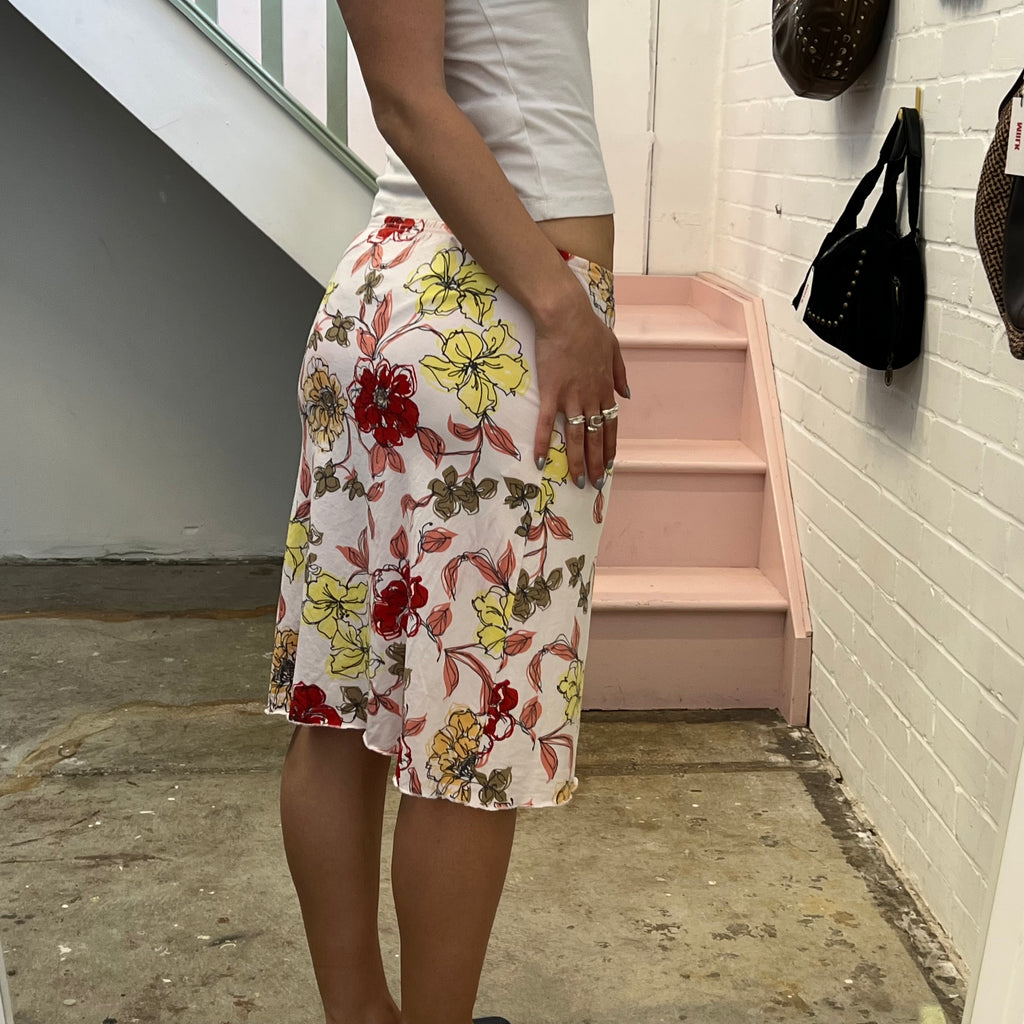 White red and yellow floral mid skirt