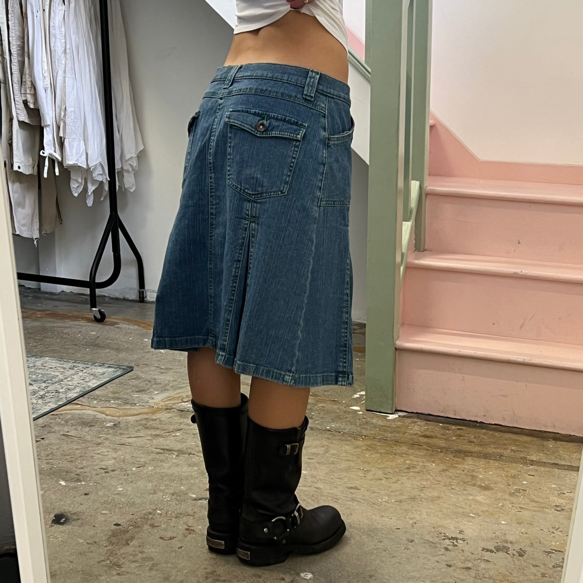 Denim pleated midi skirt with green stitching