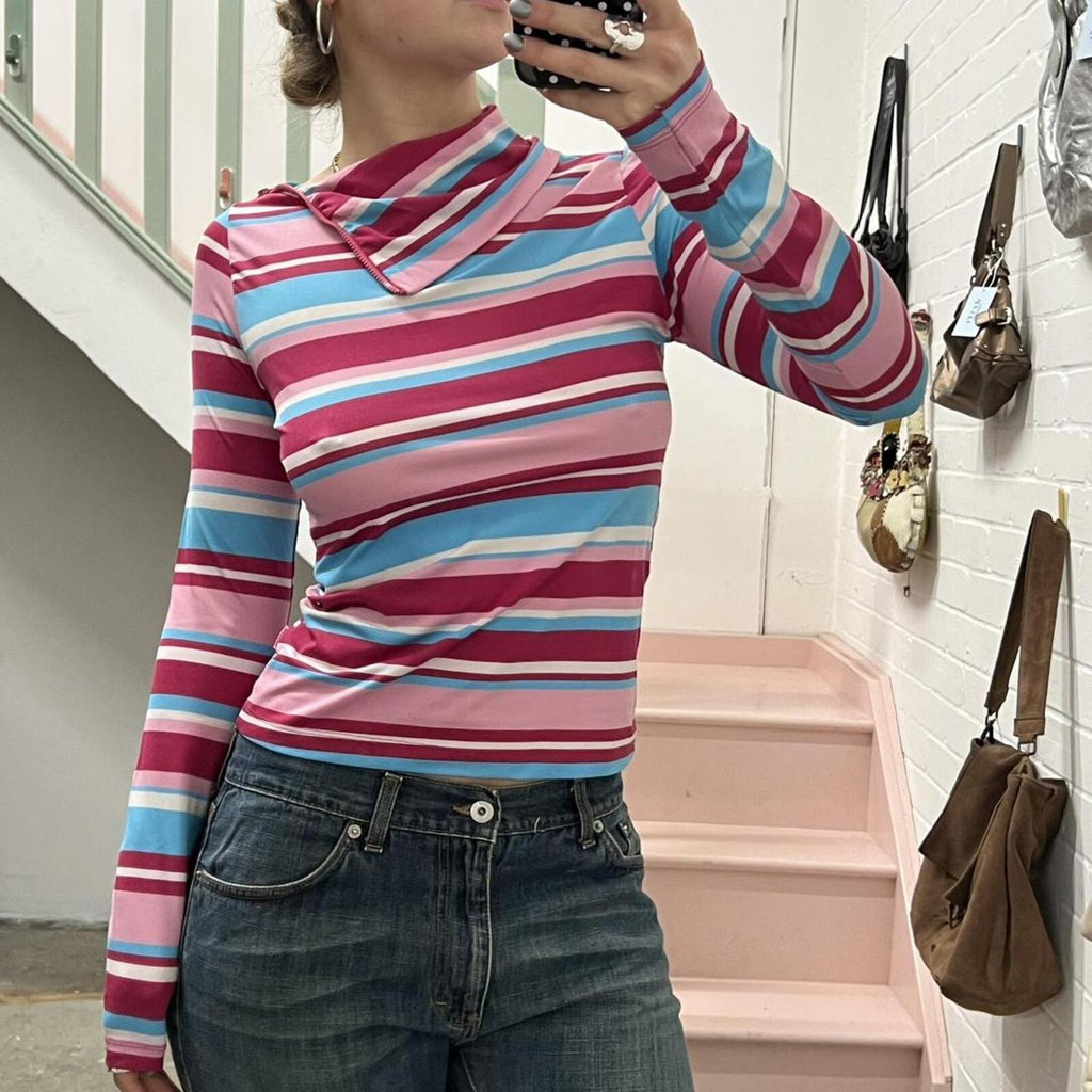 pink and blue striped high neck fitted top with zip detail