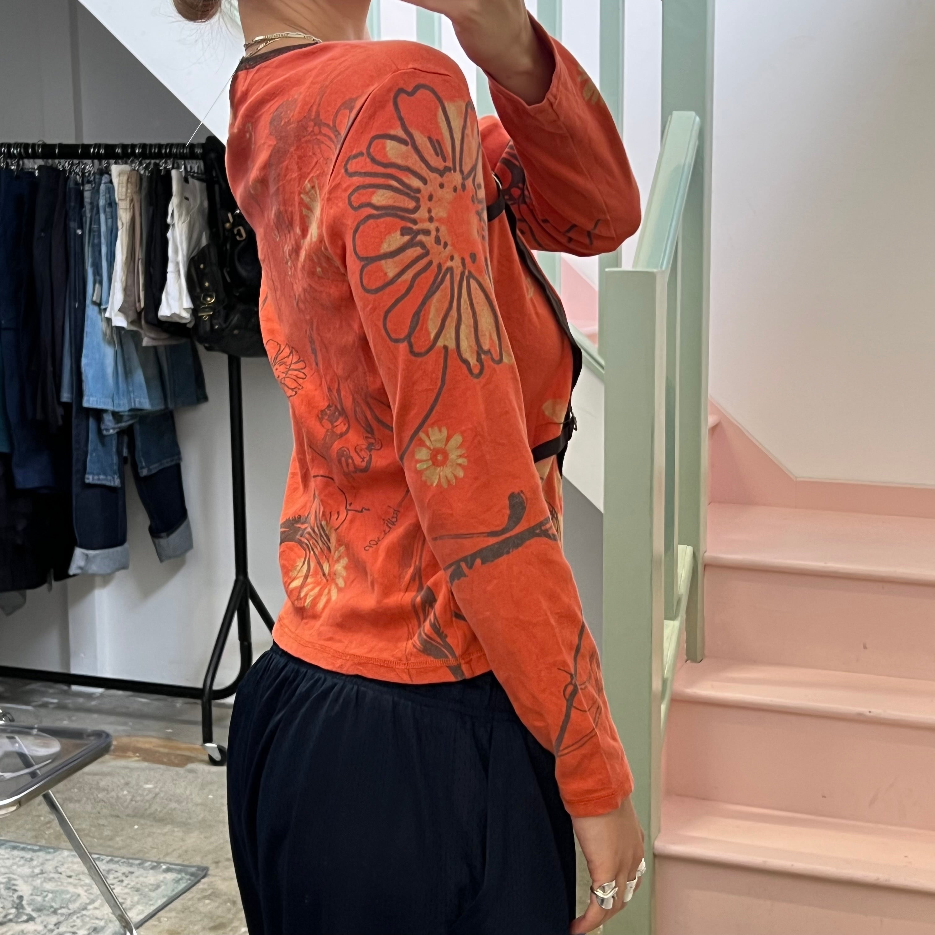 Orange blurred floral long sleeve top