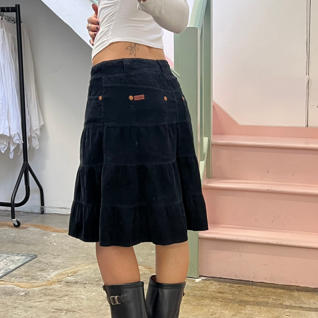 Black tiered corduroy midi skirt