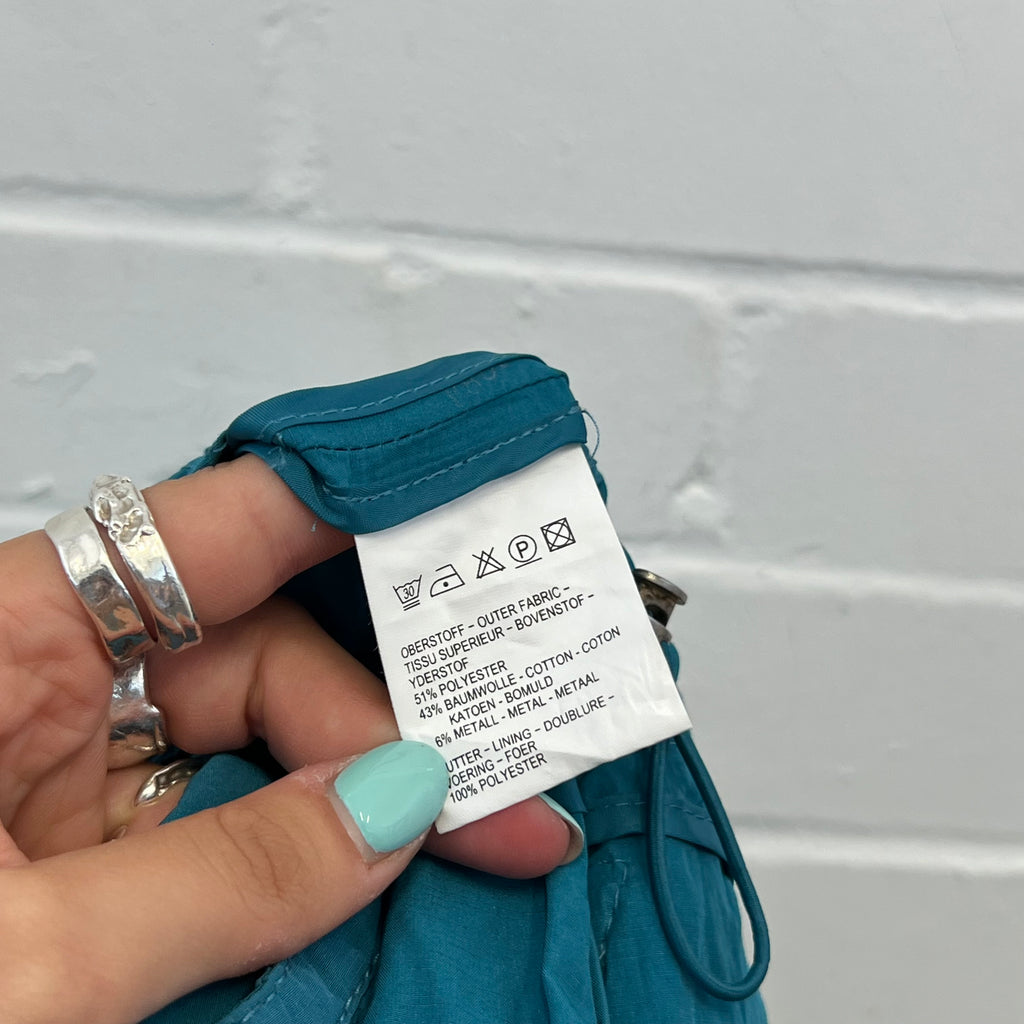 Blue zip up fitted jacket