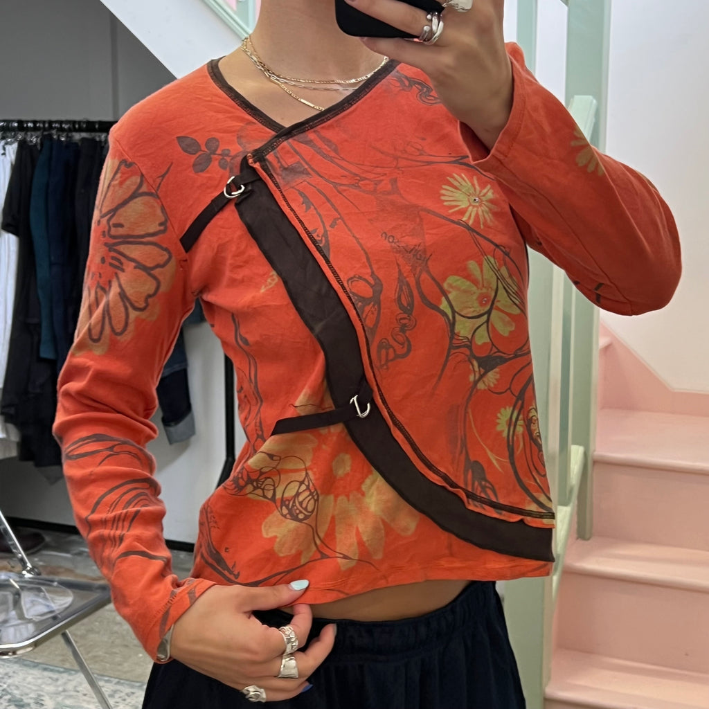 Orange blurred floral long sleeve top