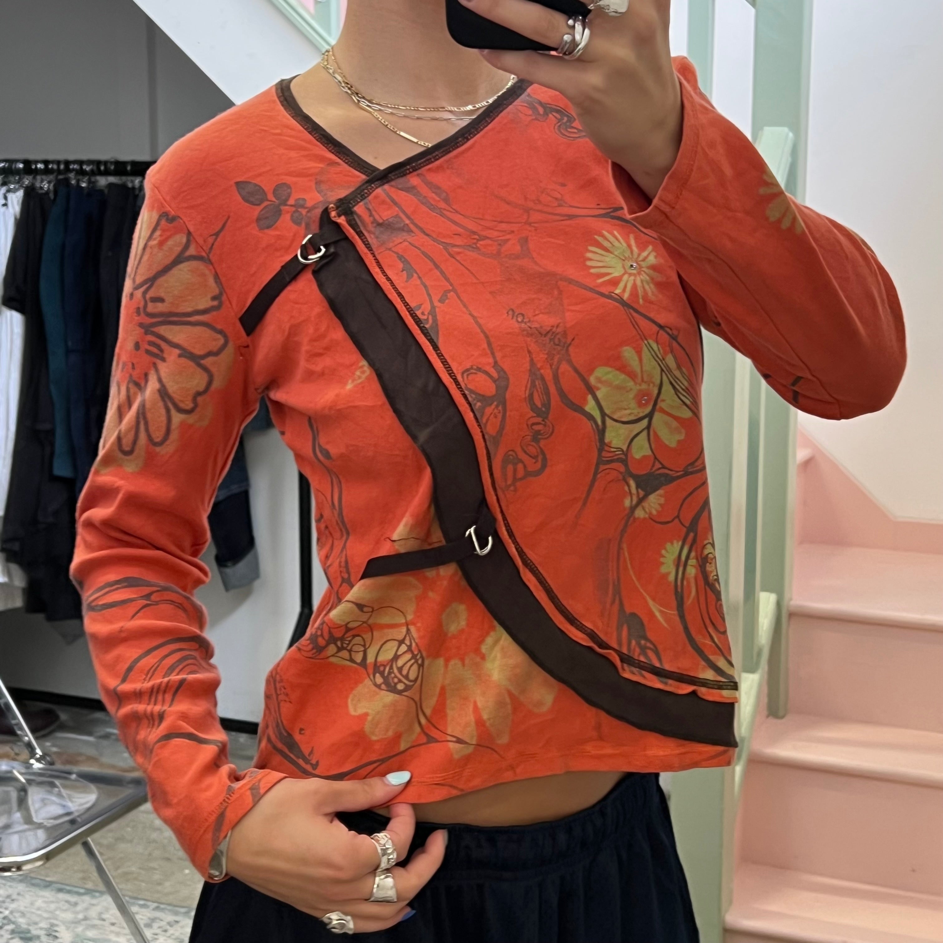 Orange blurred floral long sleeve top