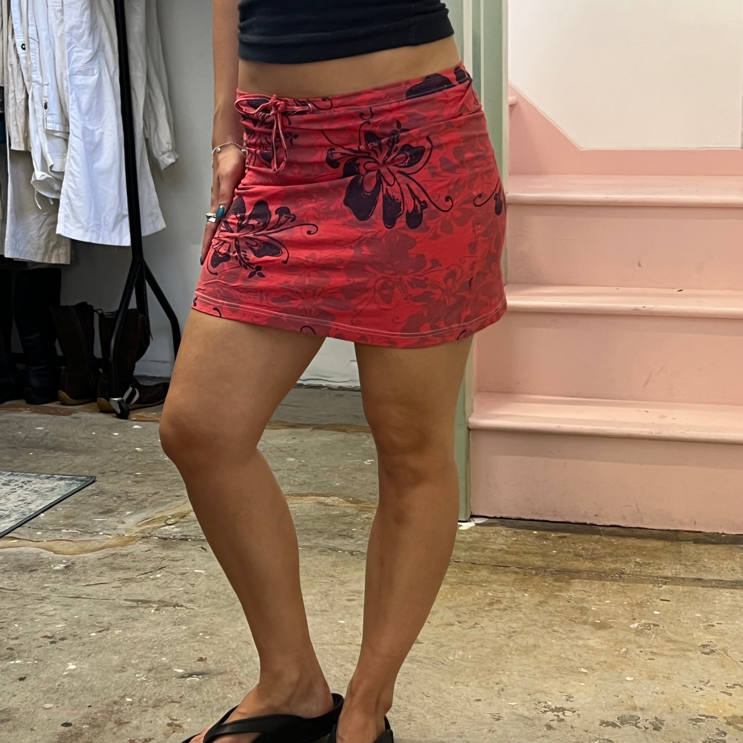 Red and purple hibiscus print mini skirt