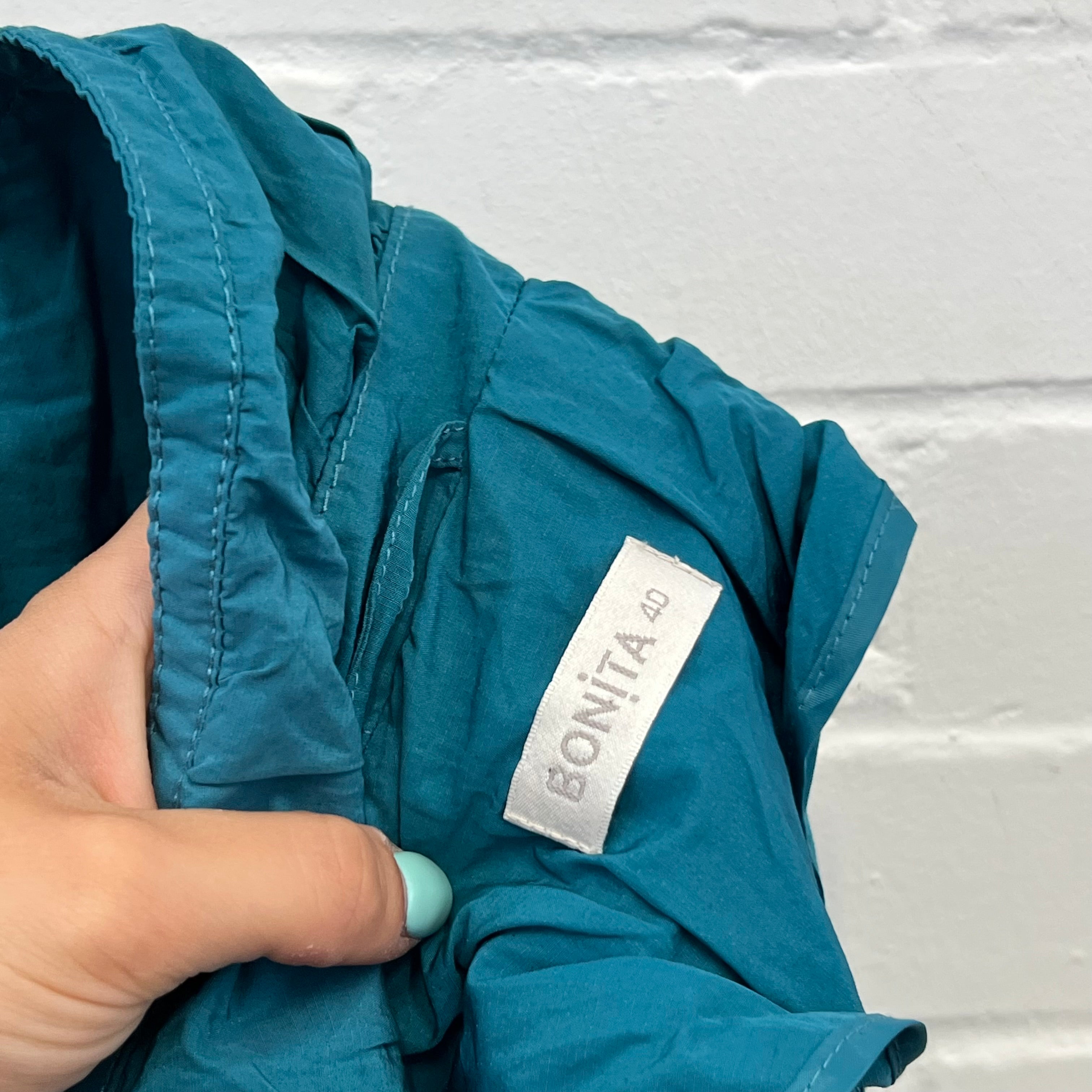 Blue zip up fitted jacket