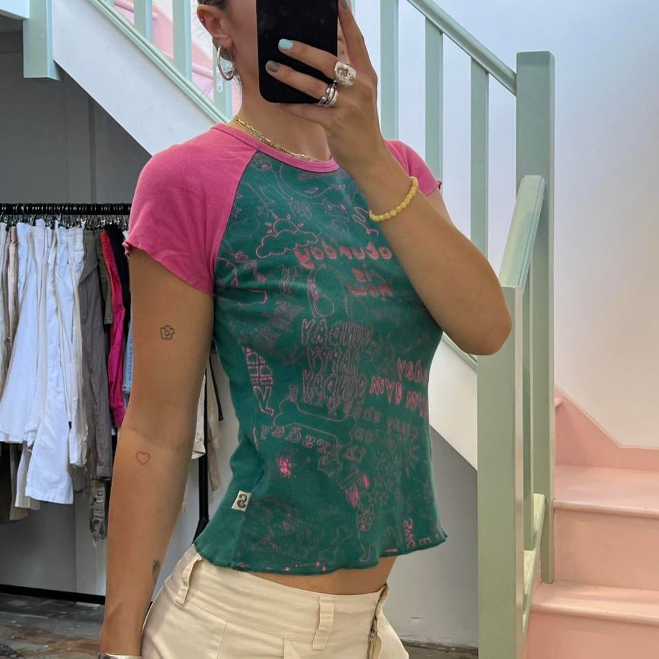 Green and pink graphic print baby tee