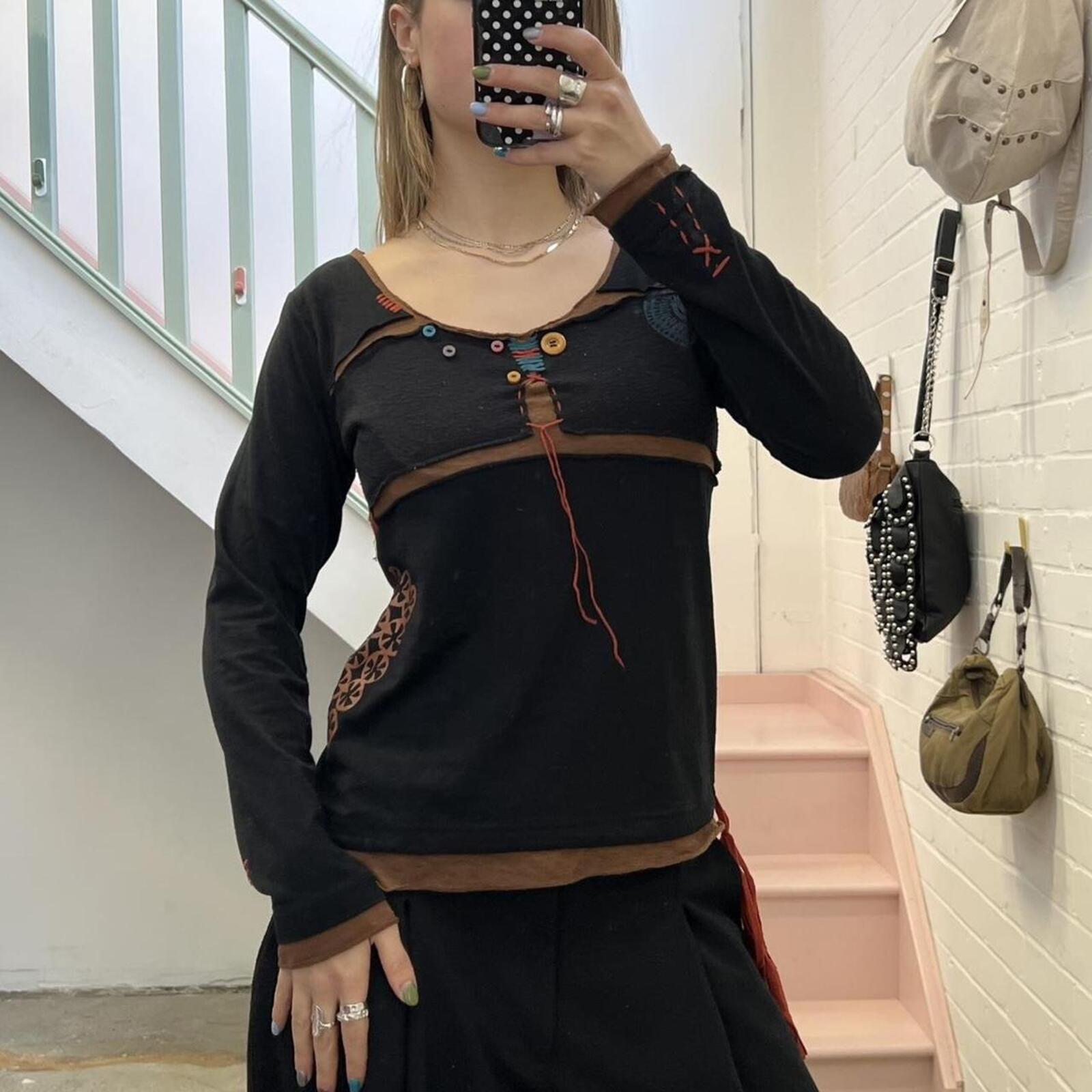 black archival vintage top with buttons and contrast stitching