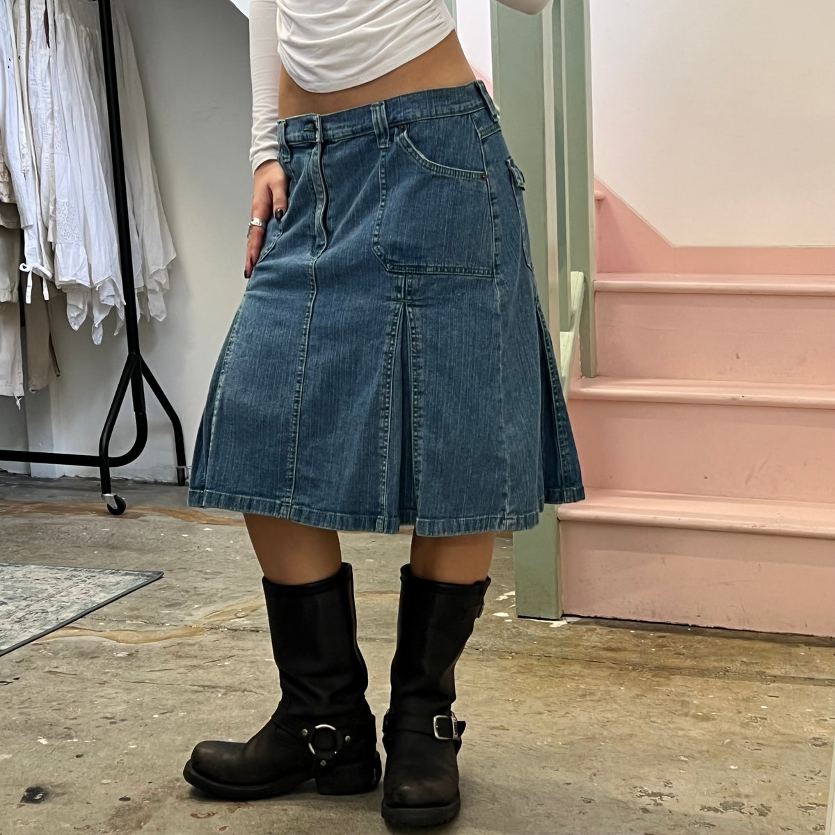 Denim pleated midi skirt with green stitching