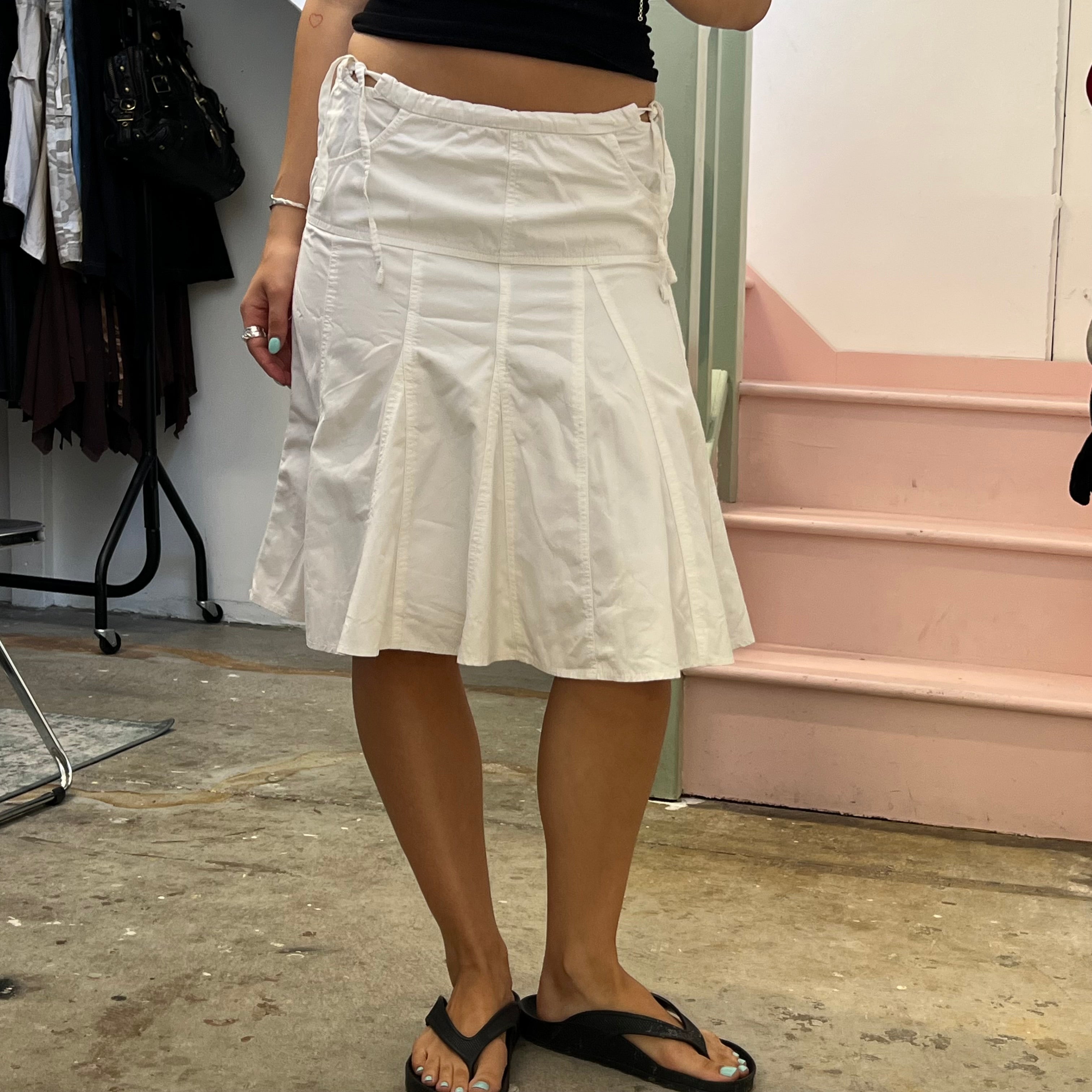 White pleated low rise midi skirt