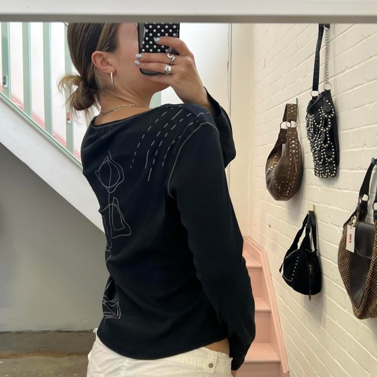 Black and pink graphic long sleeve top