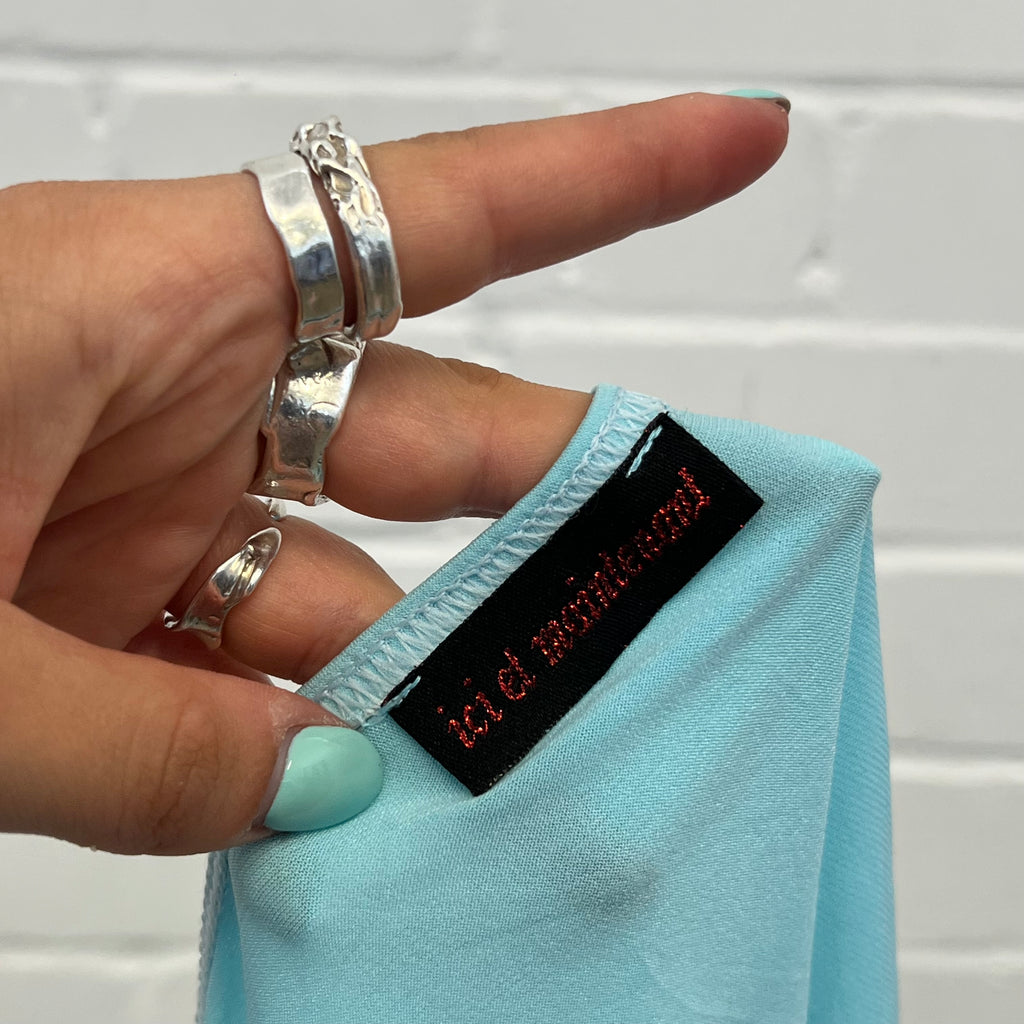 Light blue floaty asymmetrical cami