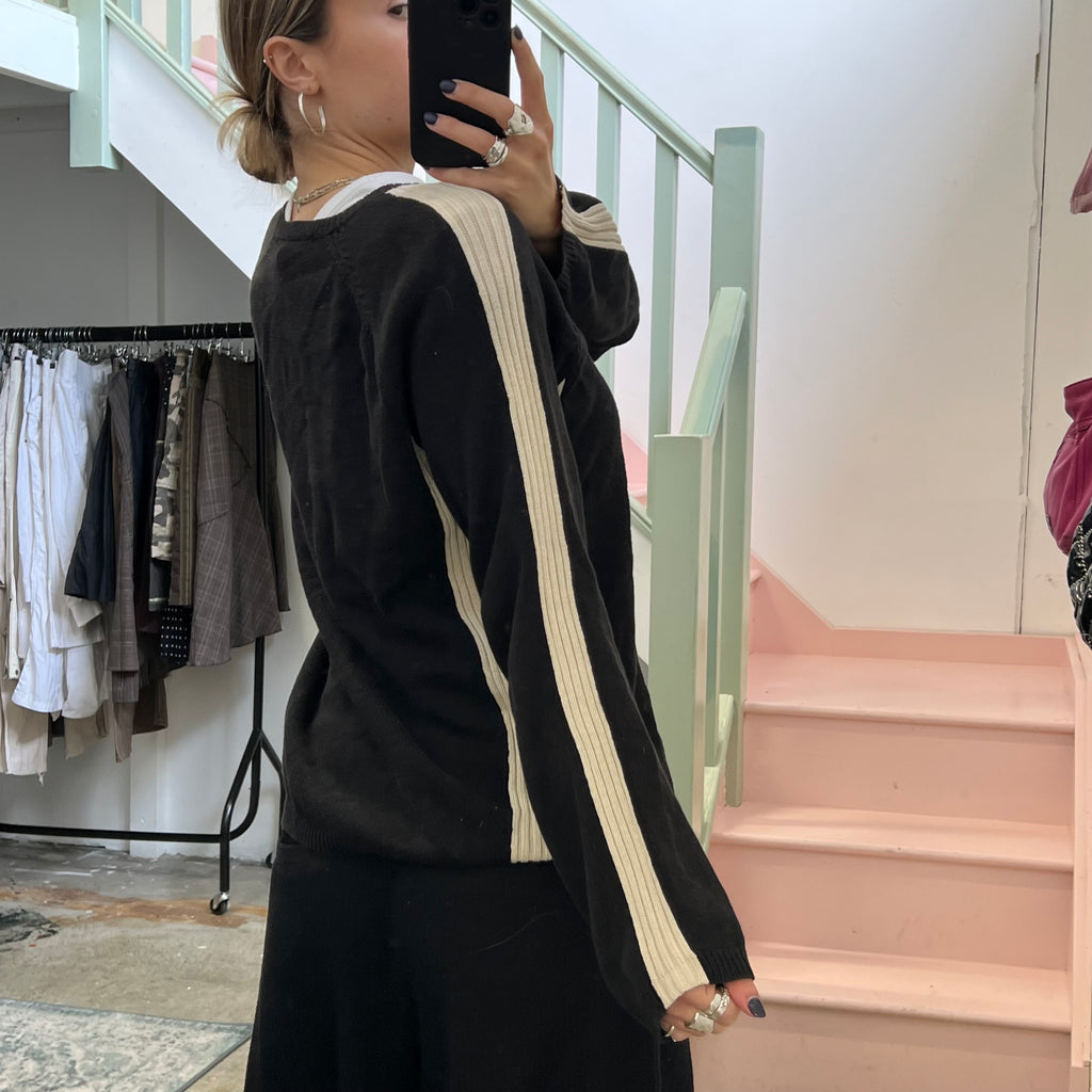 Black and cream knitted zip sweater
