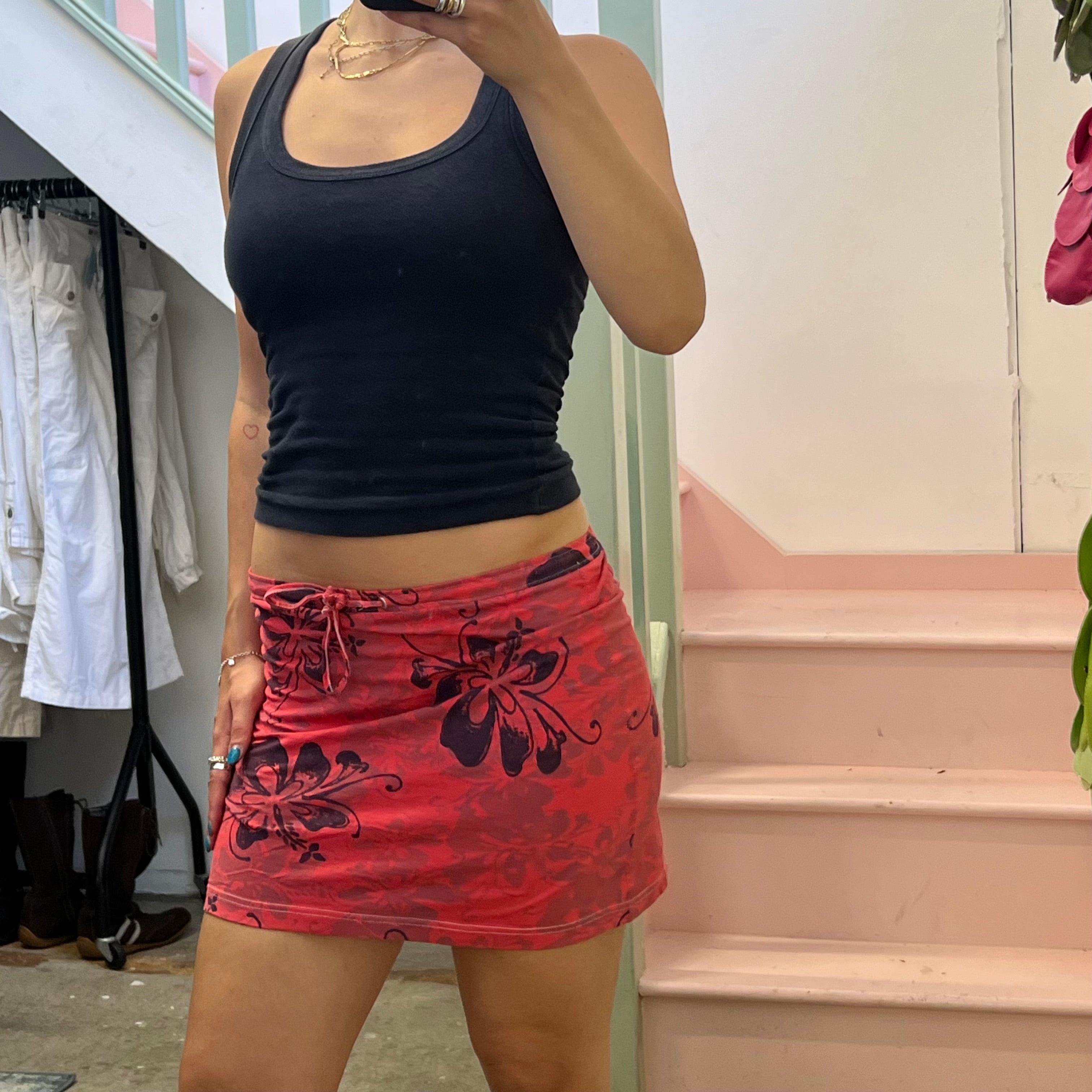 Red and purple hibiscus print mini skirt