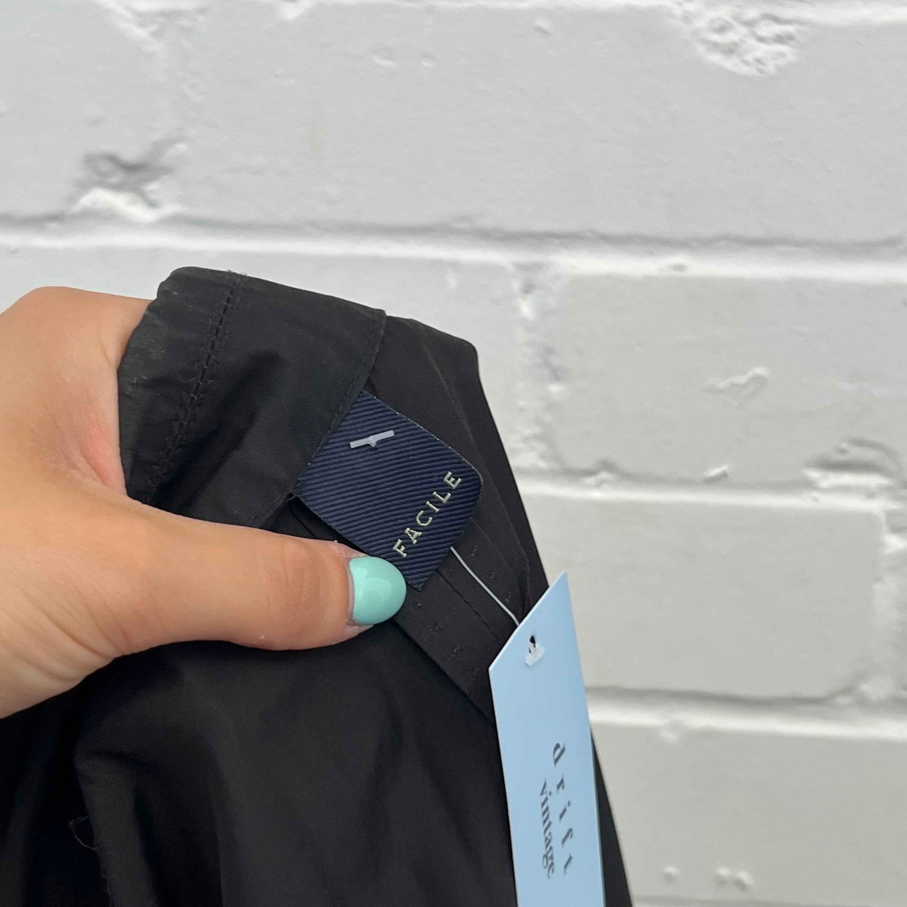 Black lightweight zip up fitted jacket