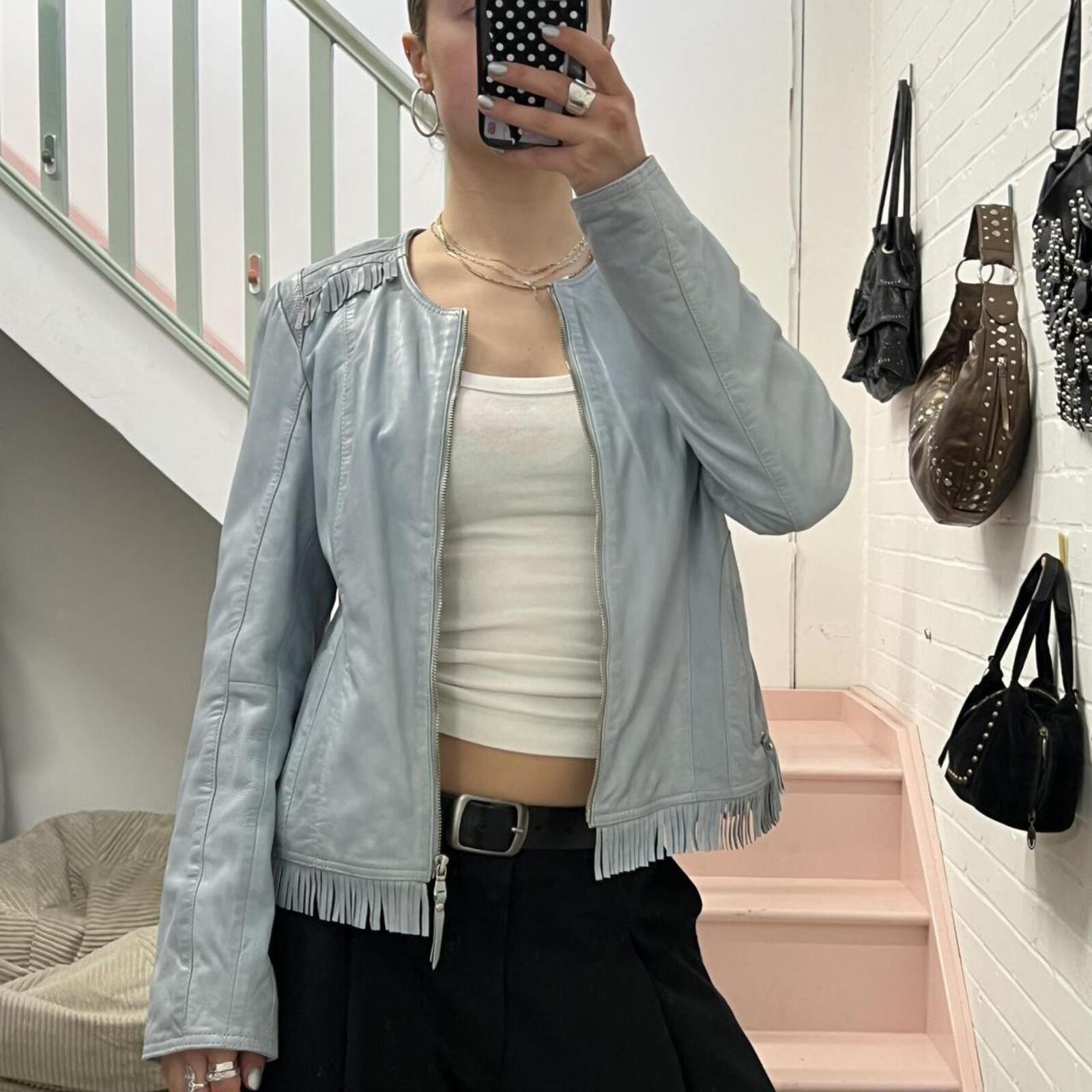 Baby blue fitted zip up leather jacket with fringing