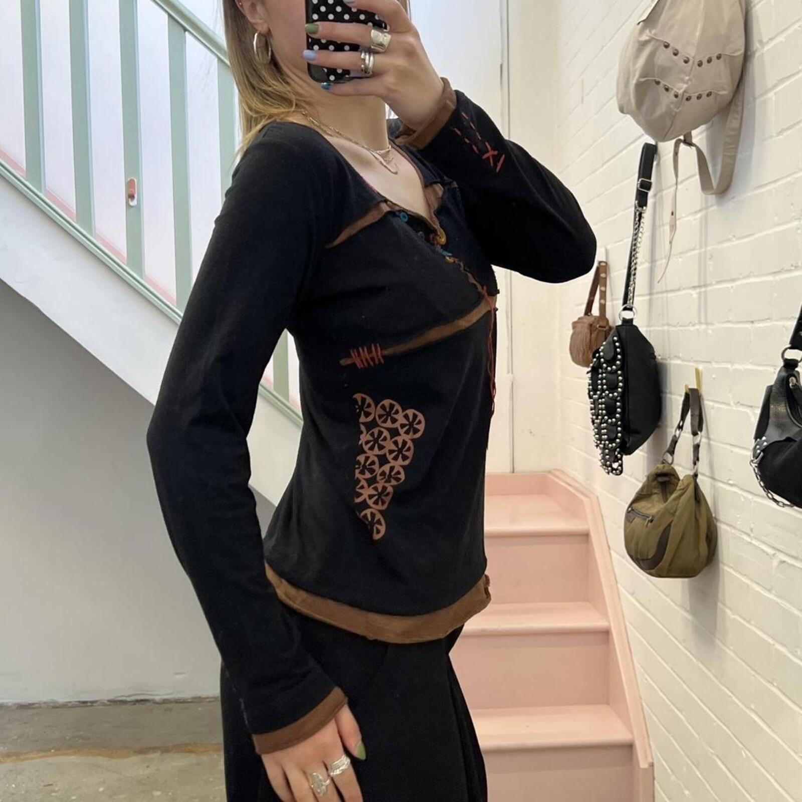 black archival vintage top with buttons and contrast stitching