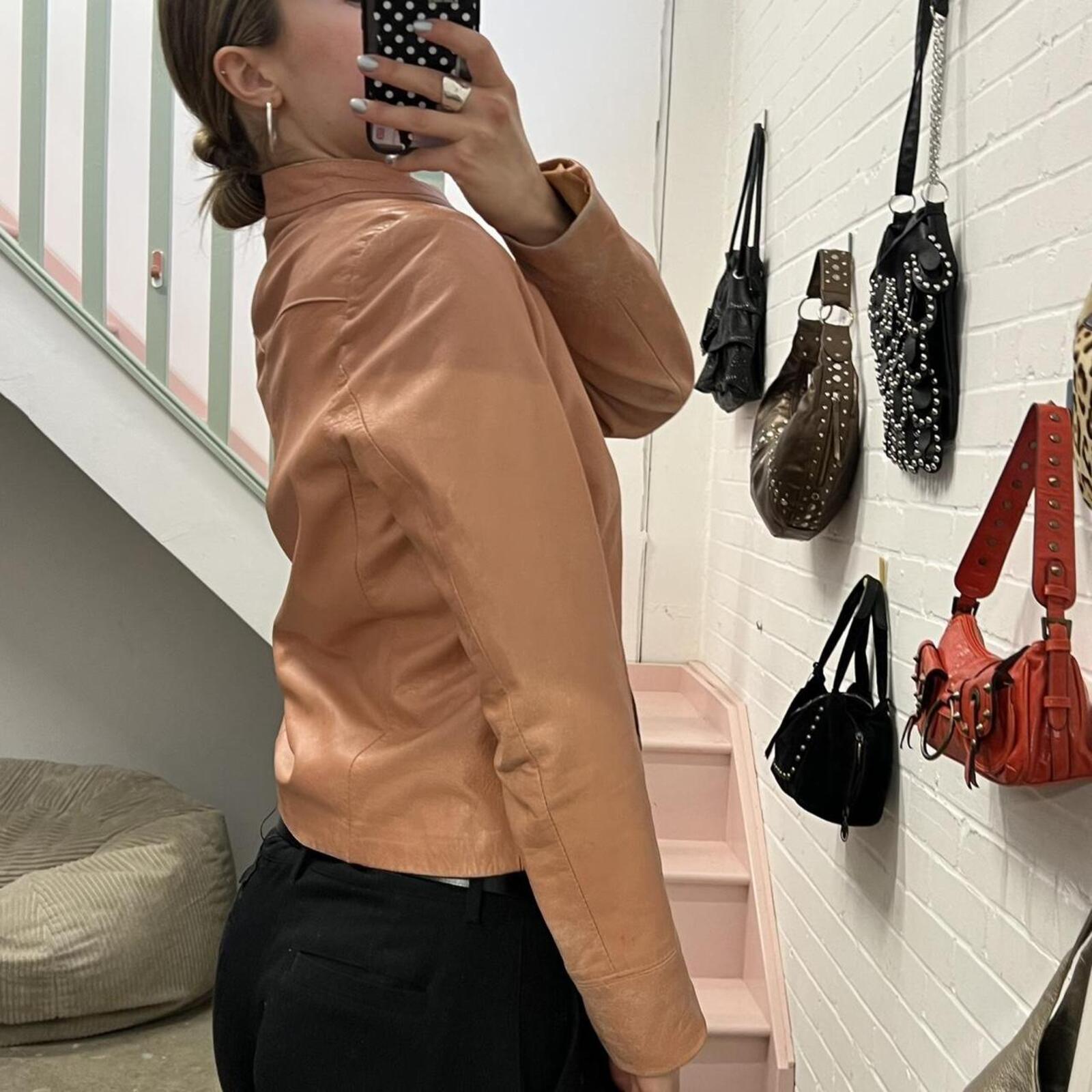 baby pink dusty pink zip up fitted vintage leather jacket with dual zip