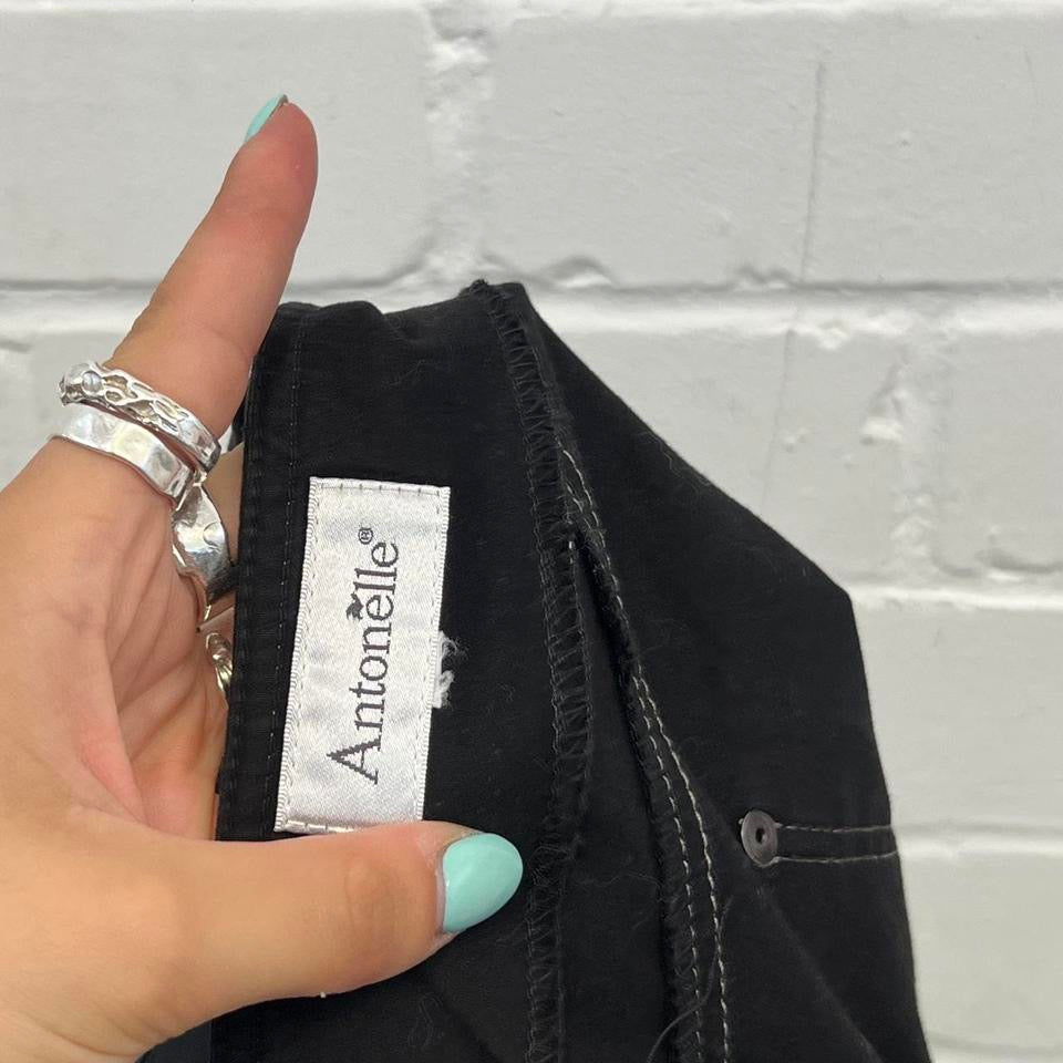 Black tailored pencil skirt with contrast stitching