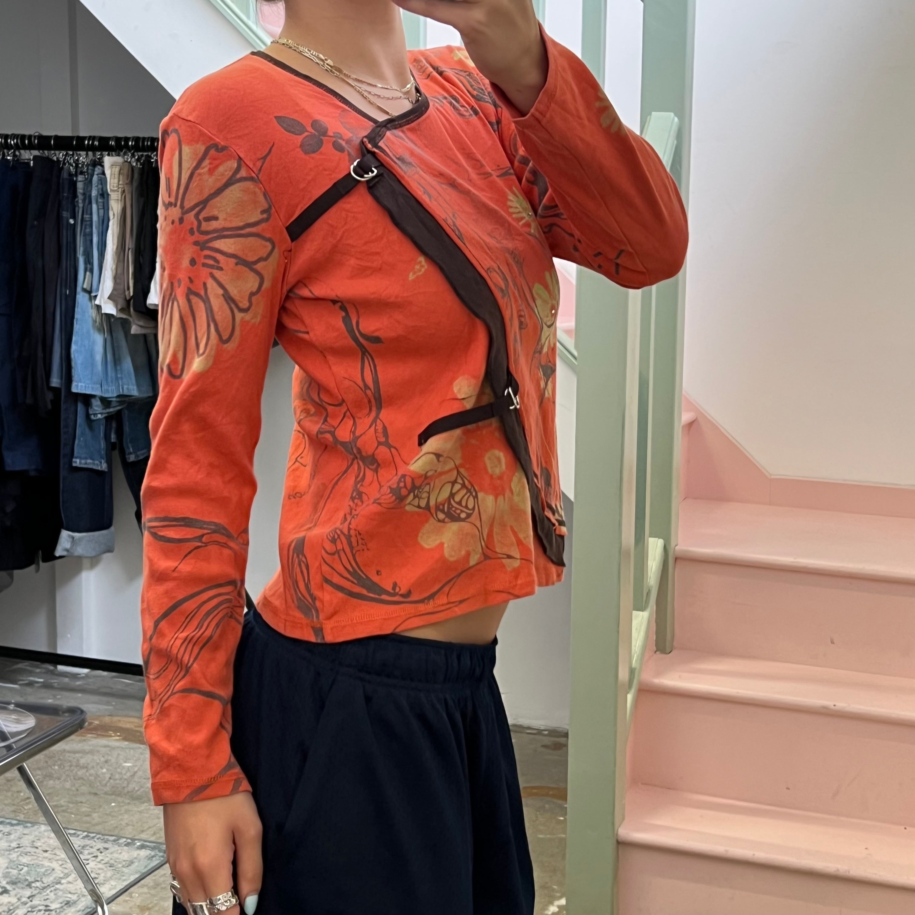 Orange blurred floral long sleeve top
