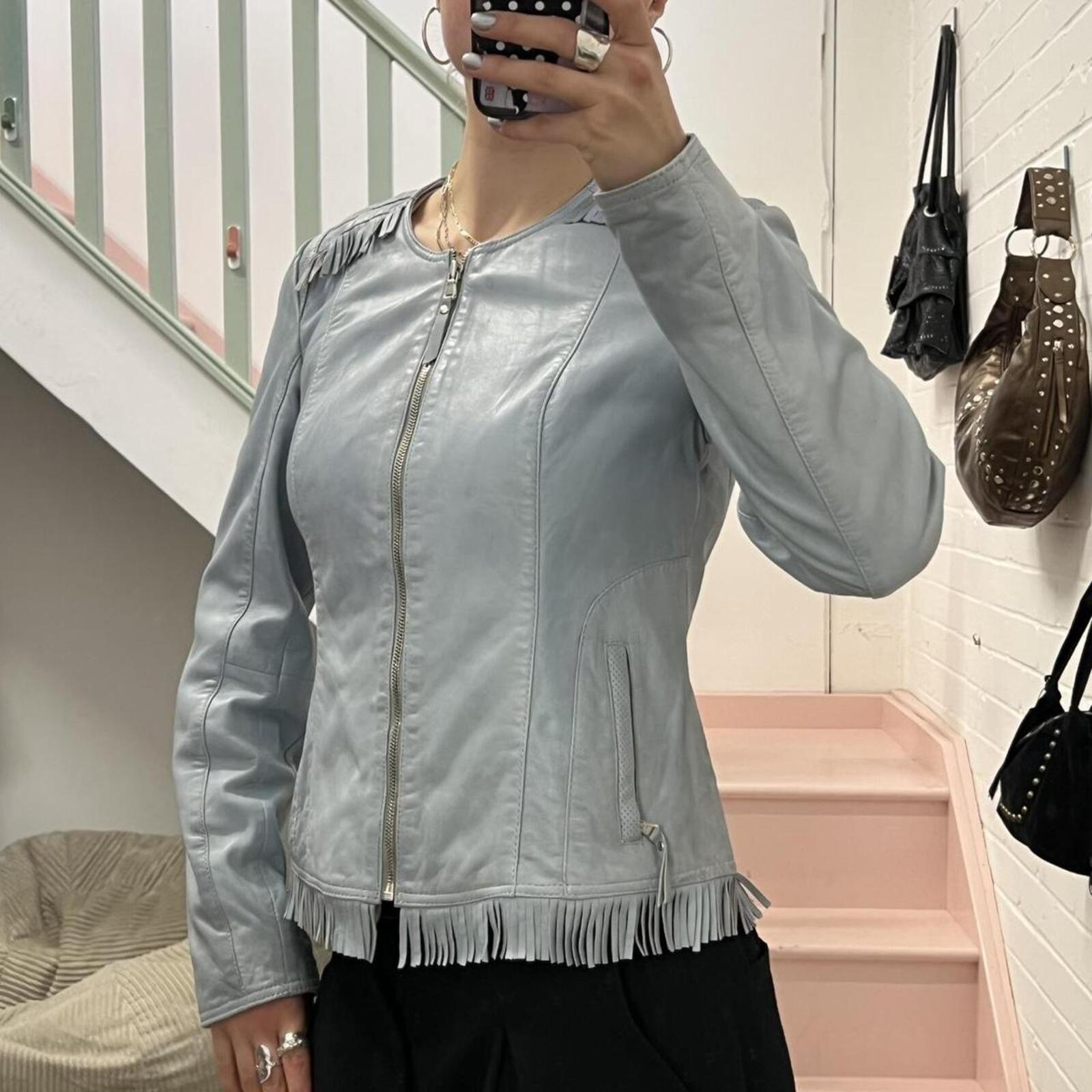 Baby blue fitted zip up leather jacket with fringing