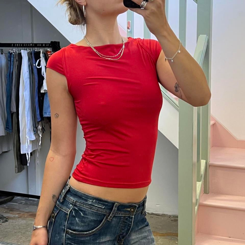 Red fitted slinky boat neck tee