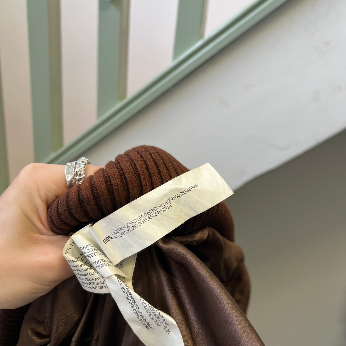 Brown leather bomber jacket