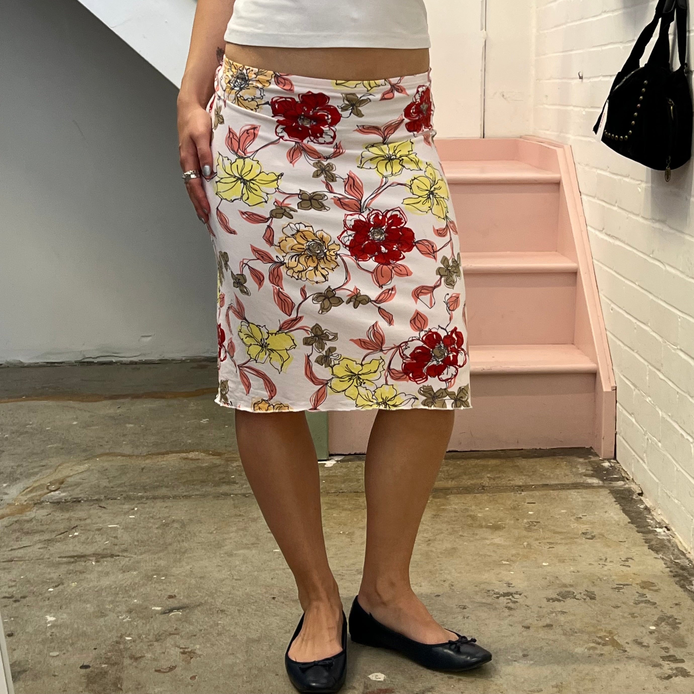 White red and yellow floral mid skirt