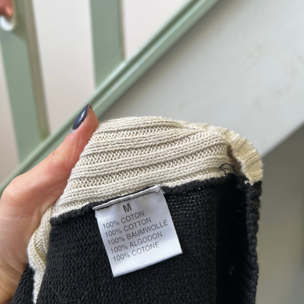 Black and cream knitted zip sweater