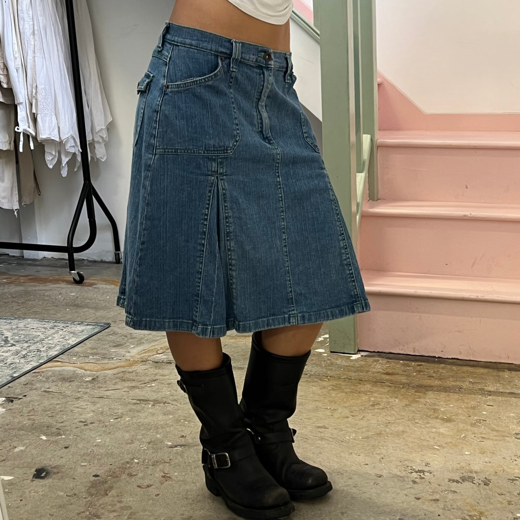 Denim pleated midi skirt with green stitching