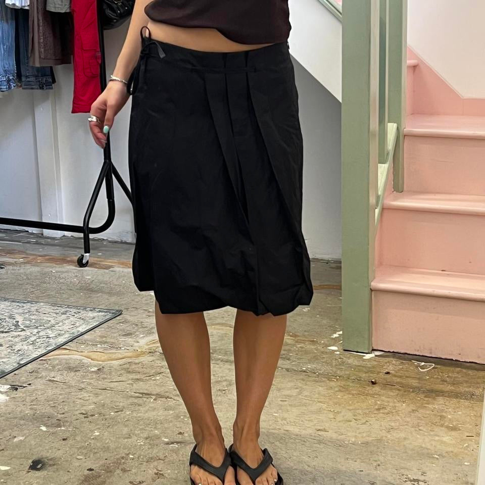 Black pleated bubble midi skirt